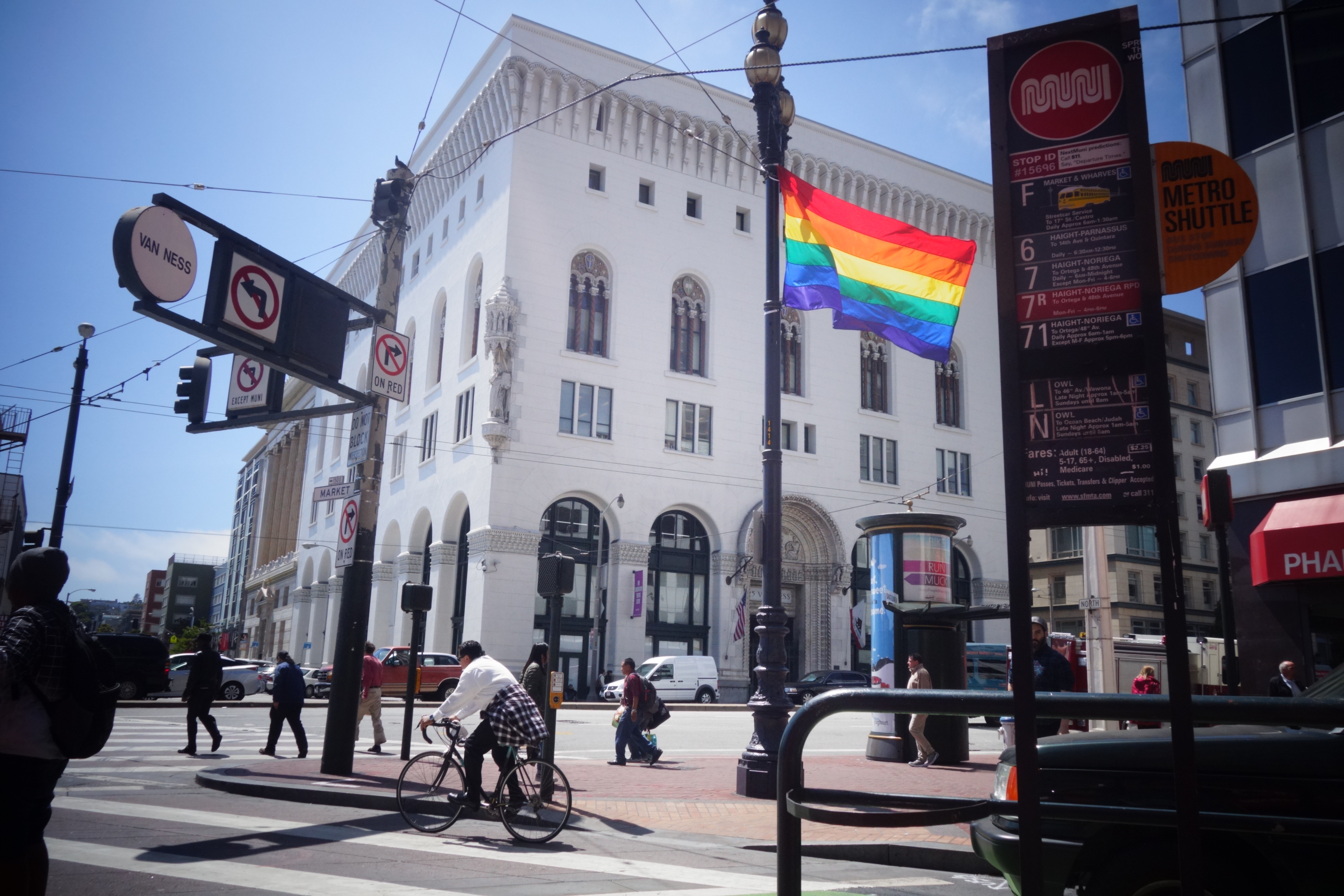 A rainbow flag, a symbol of the LGBT community, flies in San Francisco at the corners of Market Street and Van Ness on June 13, 2016. 