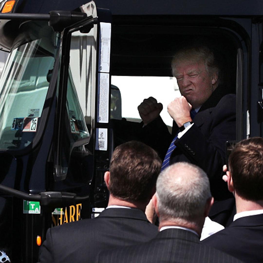 U.S. President Donald Trump sits in the cab of a truck as he welcomes members of American Trucking Associations to the White House March 23, 2017 in Washington, DC.