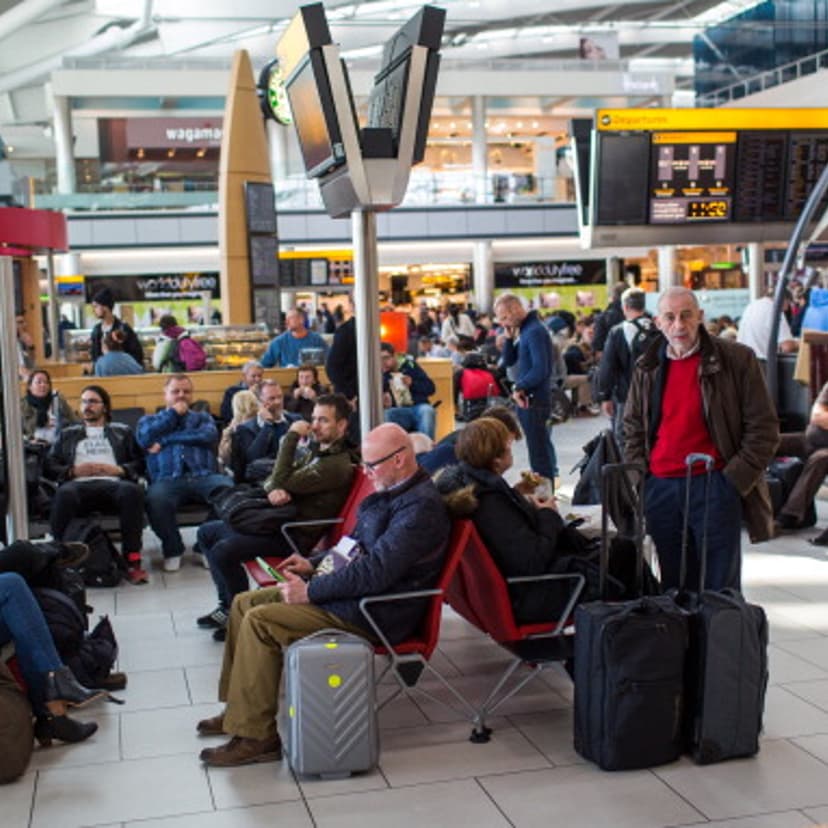 Passengers wait at London Heathrow International Airport