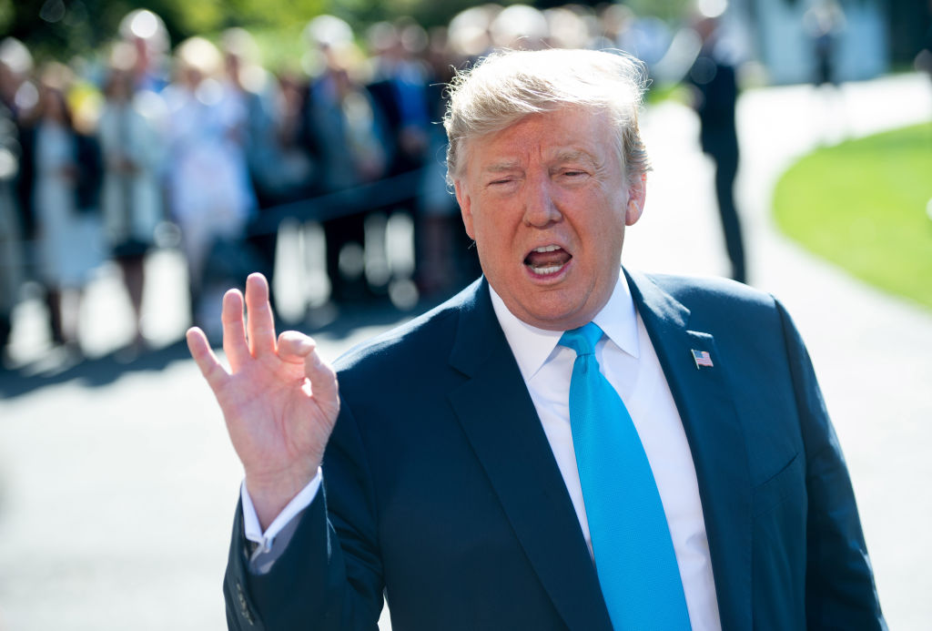 President Trump speaks to reporters outside the White House