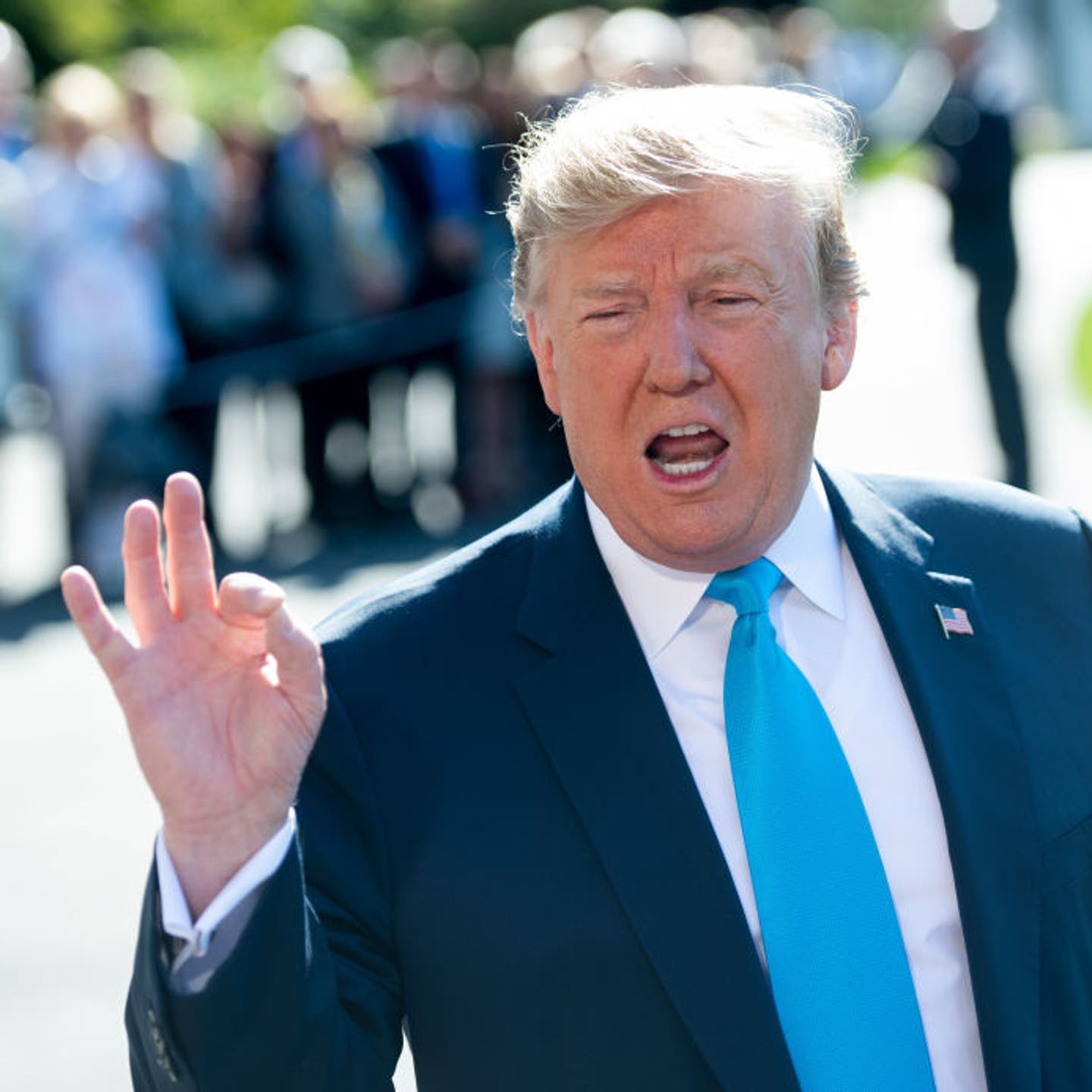 President Trump speaks to reporters outside the White House