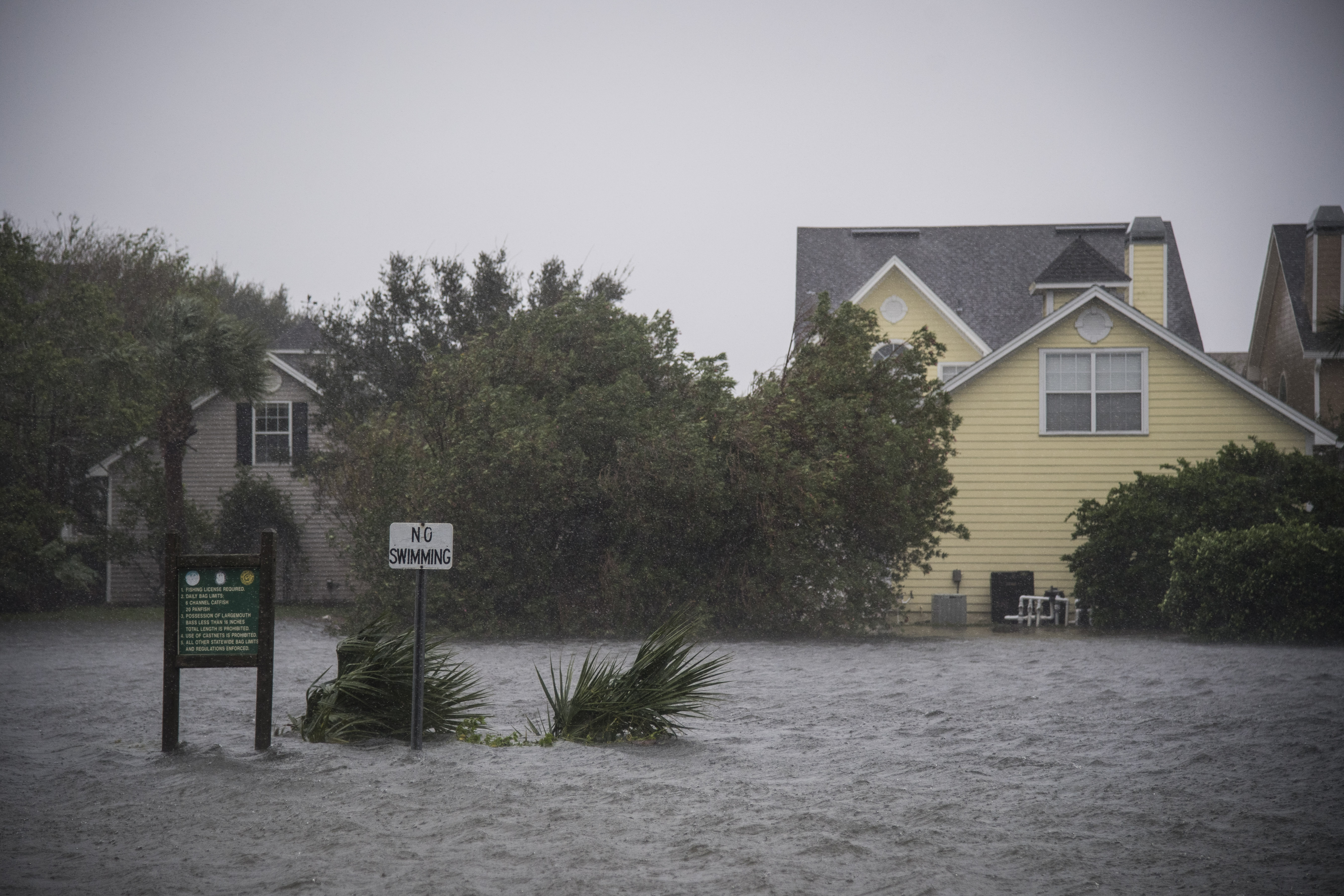 Houses stand in flooded waters near the beach as Hurricane Matthew hits in Jacksonville Beach, FL on Friday October 07, 2016.