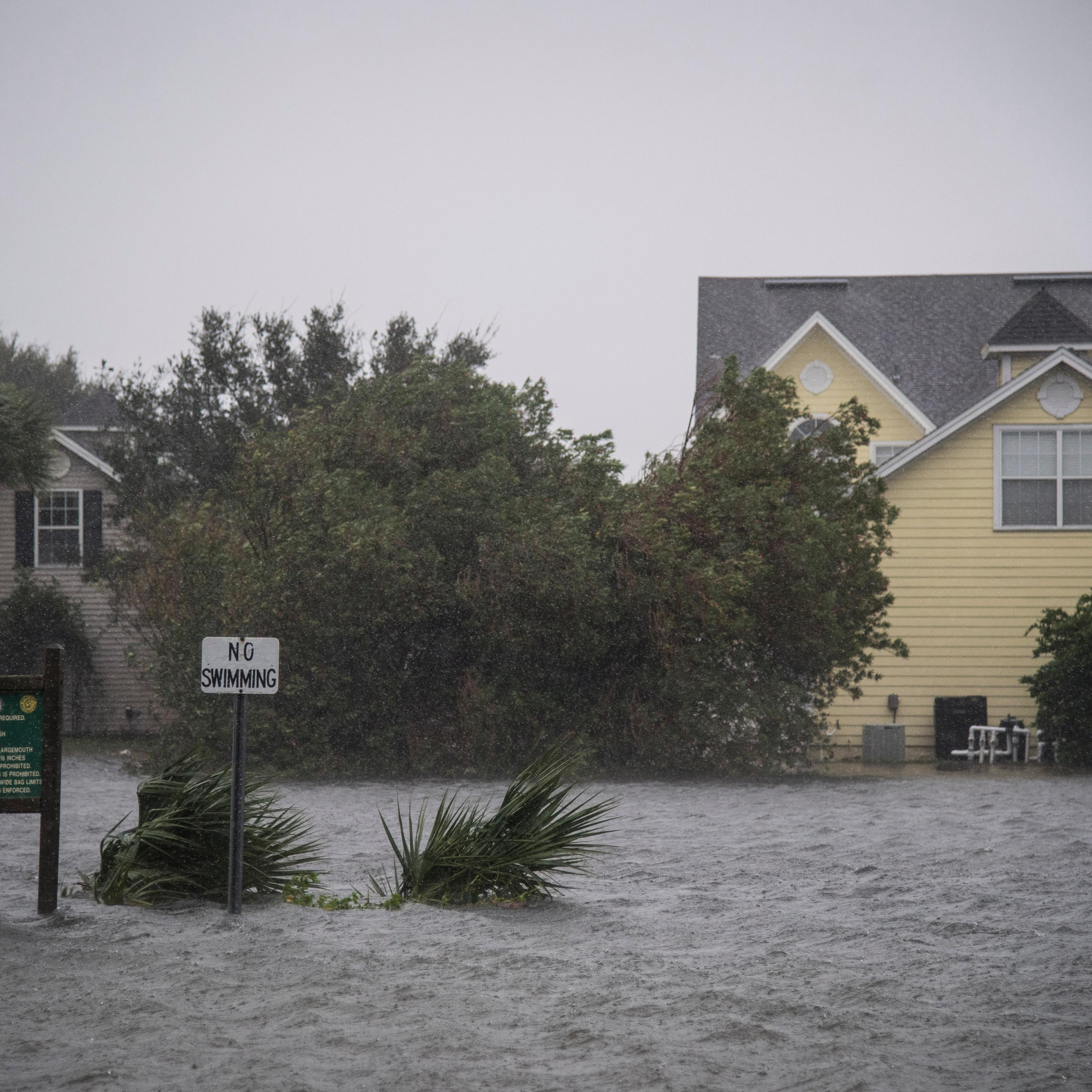 Houses stand in flooded waters near the beach as Hurricane Matthew hits in Jacksonville Beach, FL on Friday October 07, 2016.