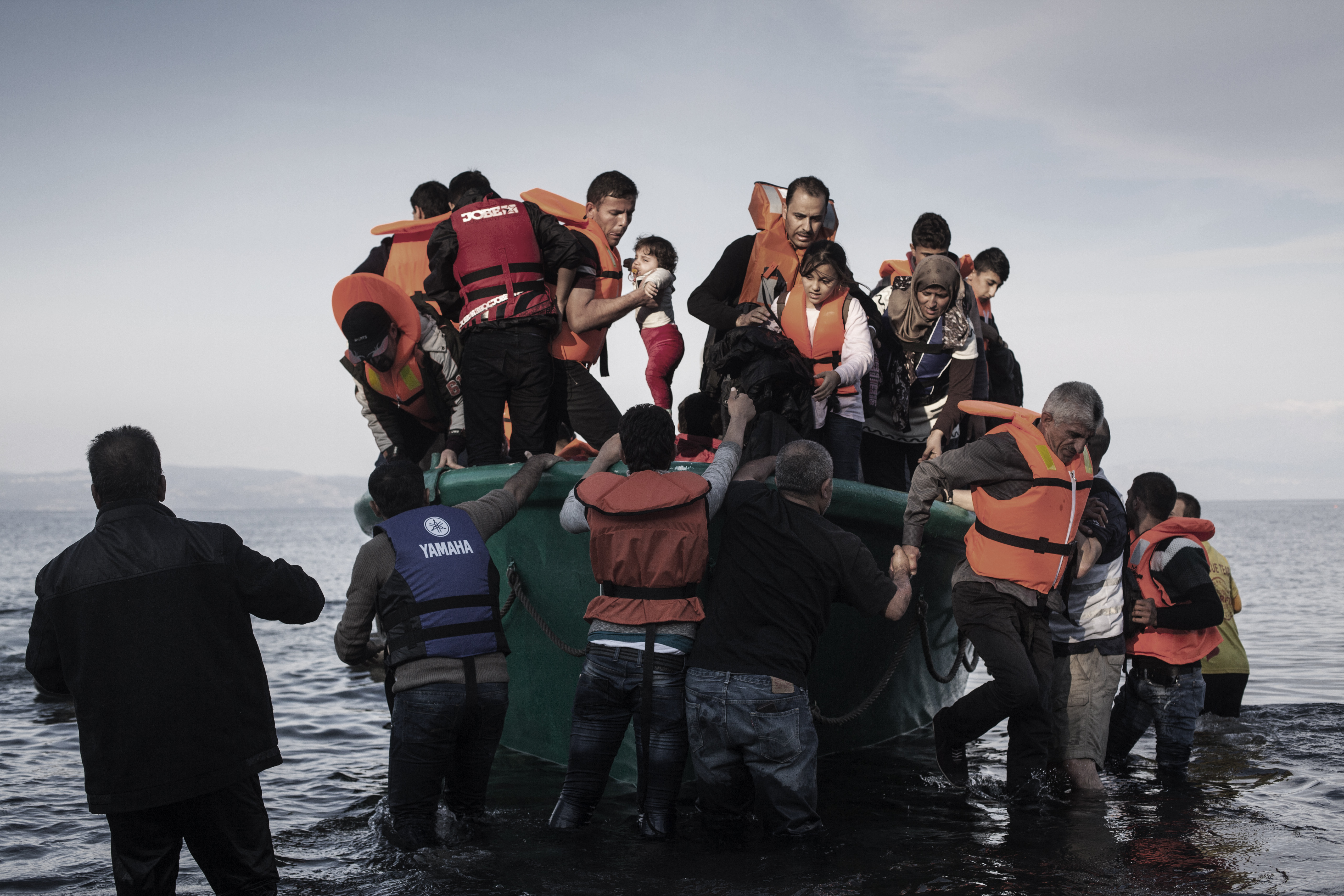 Refugees from Afghanistan and Syria arrive in boats on the shores of Lesbos near Skala Sikaminias, Greece on 10November, 2015. Lesbos, the Greek vacation island in the Aegean Sea between Turkey and Greece, faces massive refugee flows from the Middle East