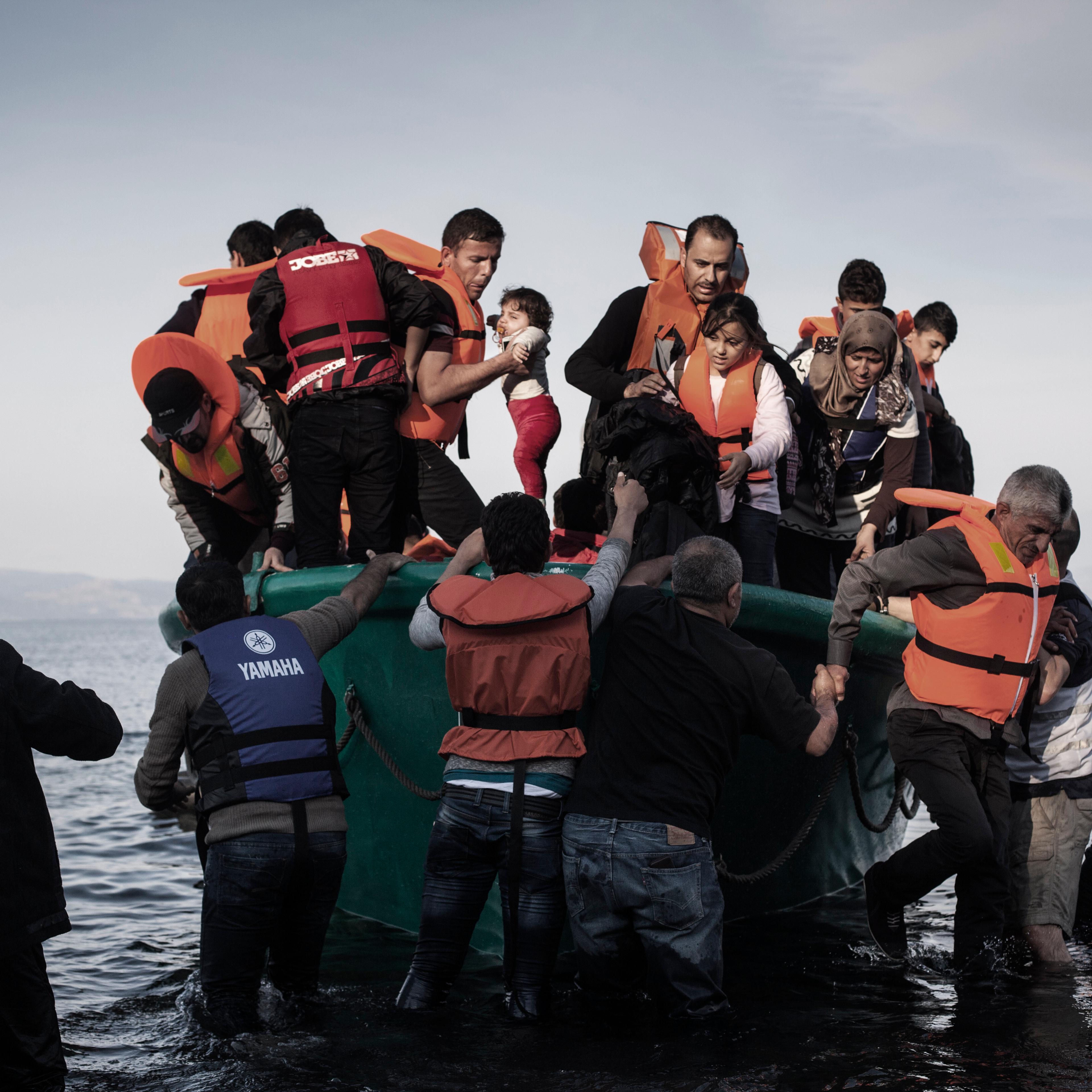 Refugees from Afghanistan and Syria arrive in boats on the shores of Lesbos near Skala Sikaminias, Greece on 10November, 2015. Lesbos, the Greek vacation island in the Aegean Sea between Turkey and Greece, faces massive refugee flows from the Middle East