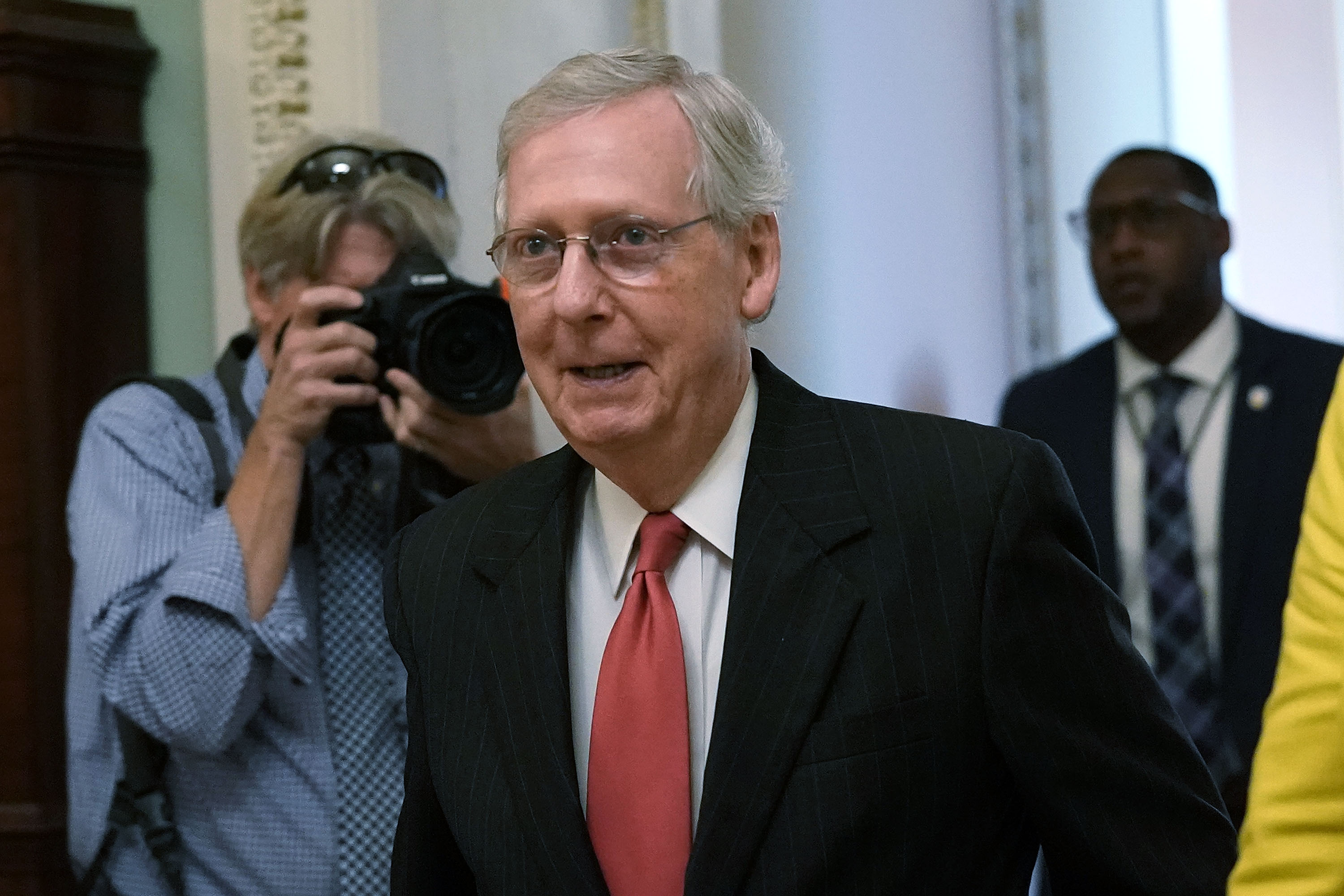 Mitch McConnell walking