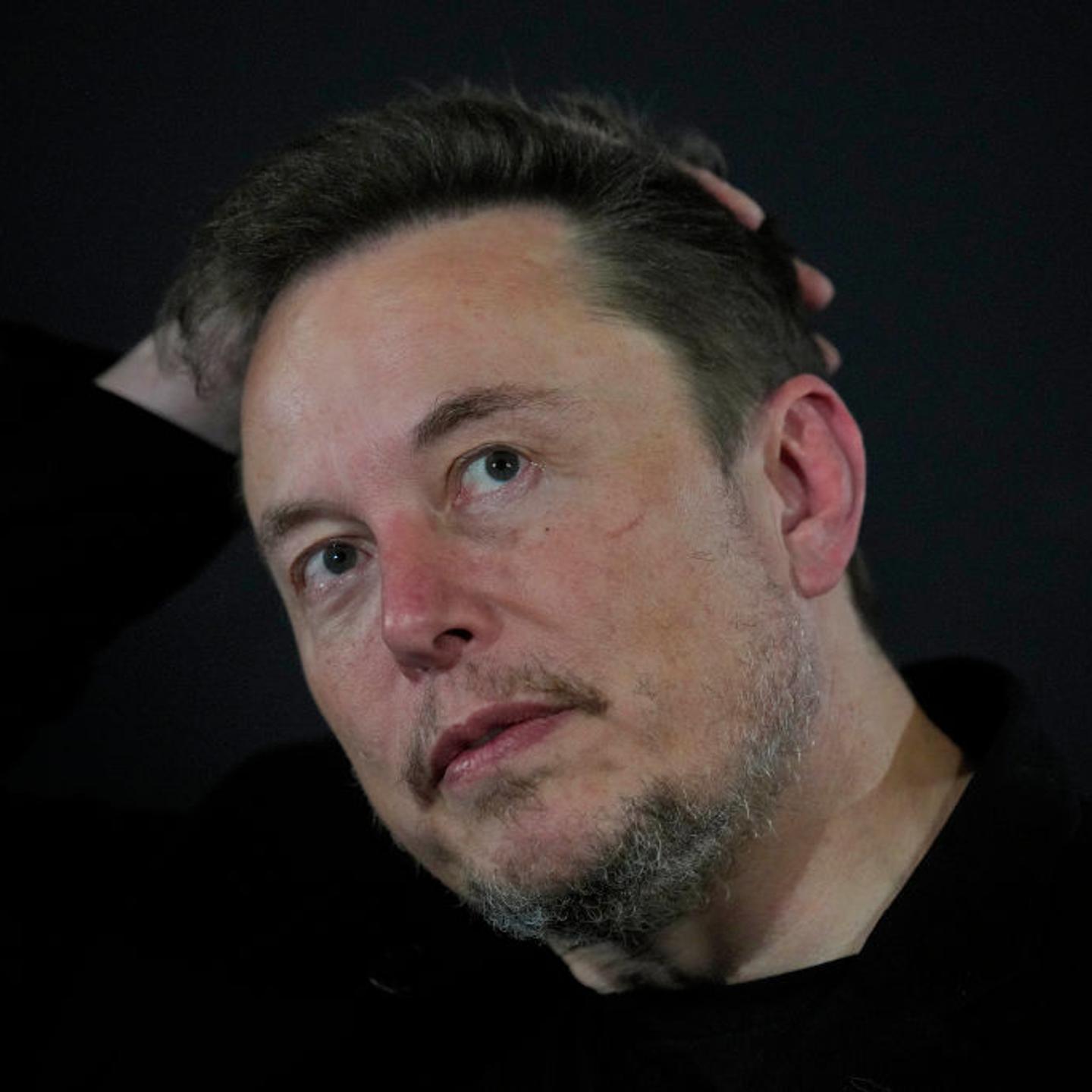 Tesla and SpaceX's CEO Elon Musk reacts during an in-conversation event with British Prime Minister Rishi Sunak at Lancaster House on Nov. 2, 2023 in London, England.