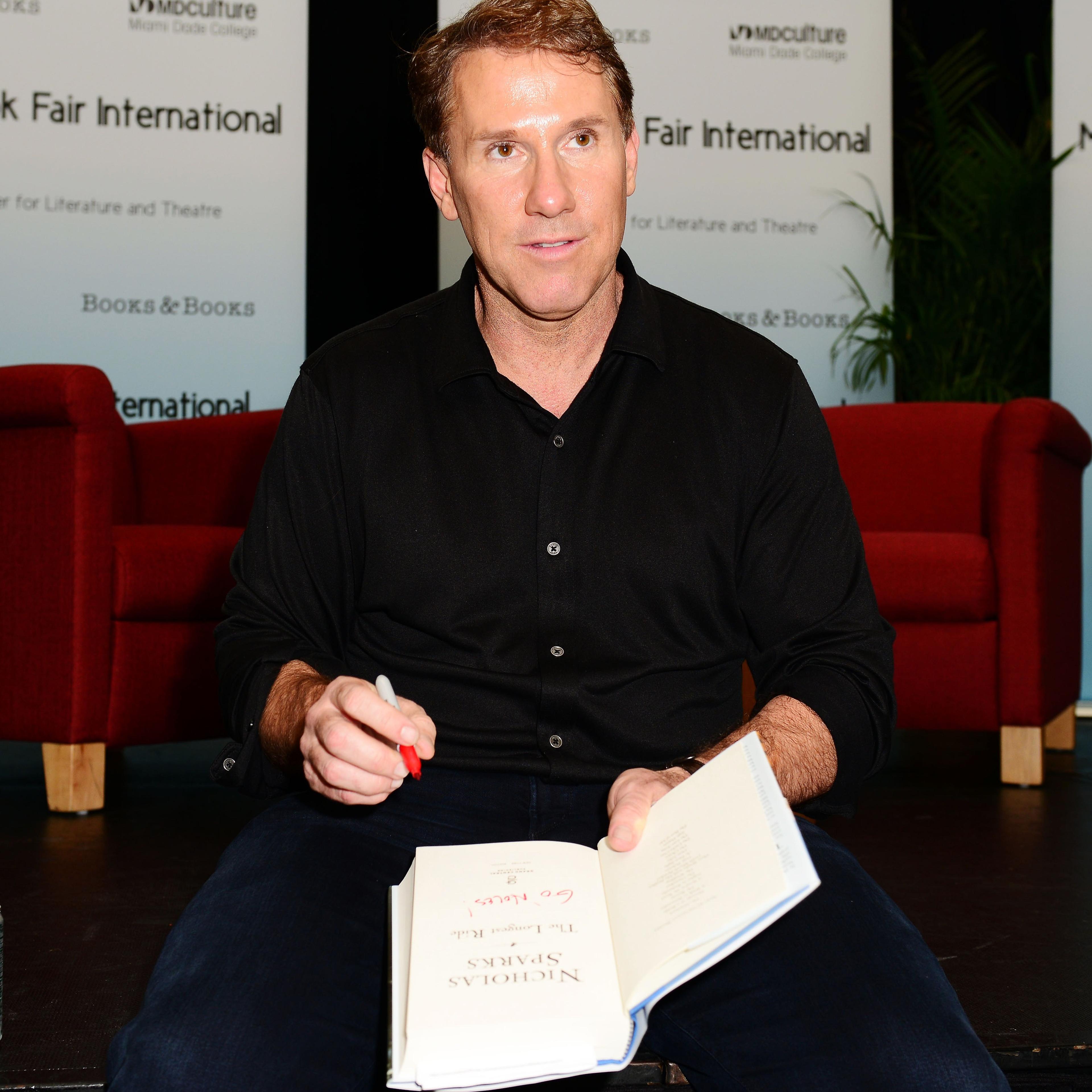 Author Nicholas Sparks discusses his book "The Longest Ride" presented by Books and Books at Chapman Conference Center at Miami Dade College on Sept. 30, 2013 in Miami.