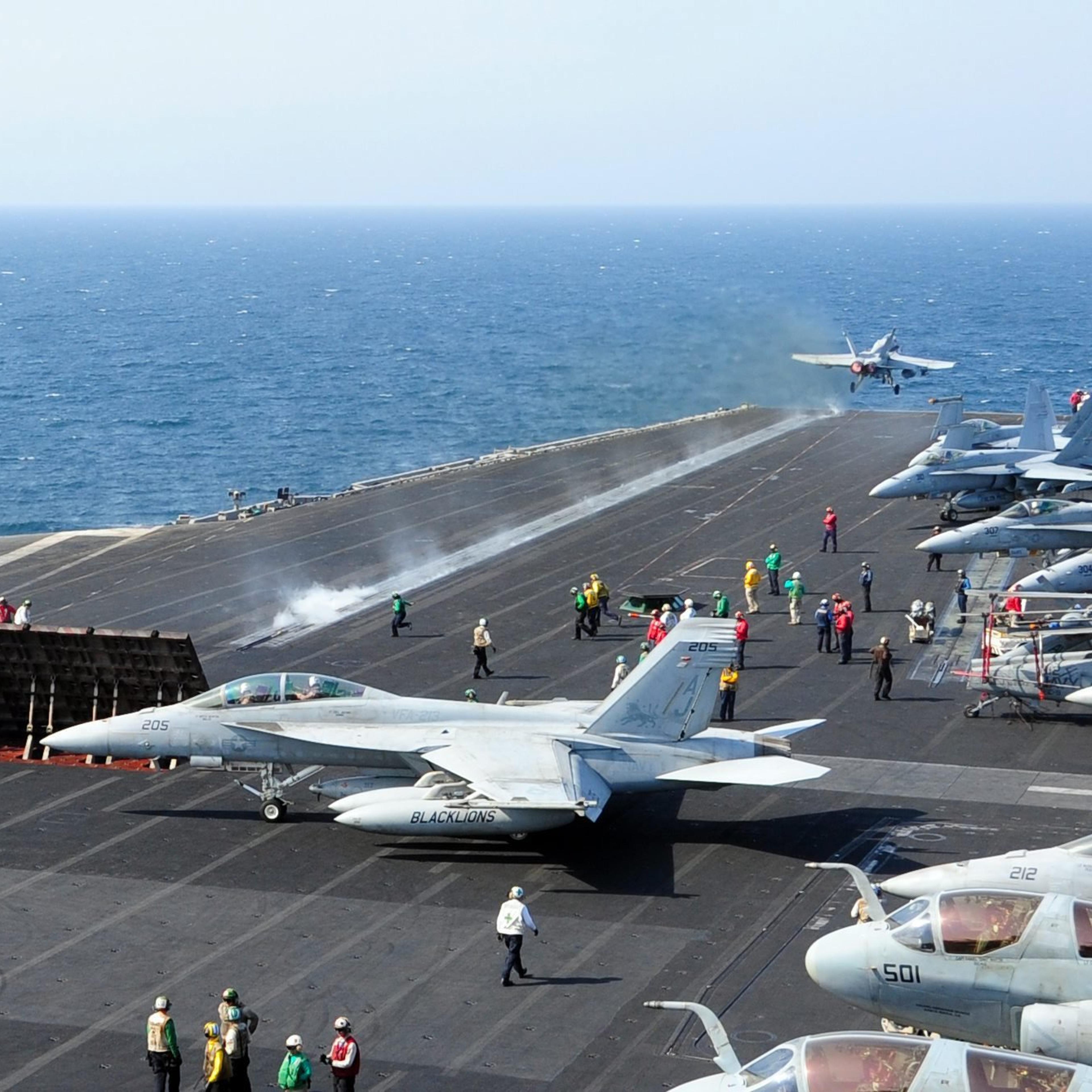 US Department of Defense (DOD) shows an aircraft launching from the flight deck of the aircraft carrier USS George H.W. Bush in the Arabian Gulf on Oct. 13, 2014.