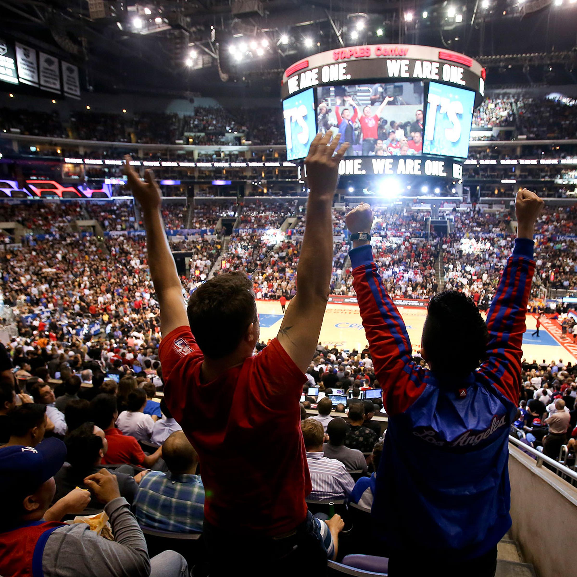 Fans show their support of the Los Angeles Clippers during Game 5 of the Clippers' opening-round NBA basketball playoff series against the Golden State Warriors on April 29, 2014, in Los Angeles