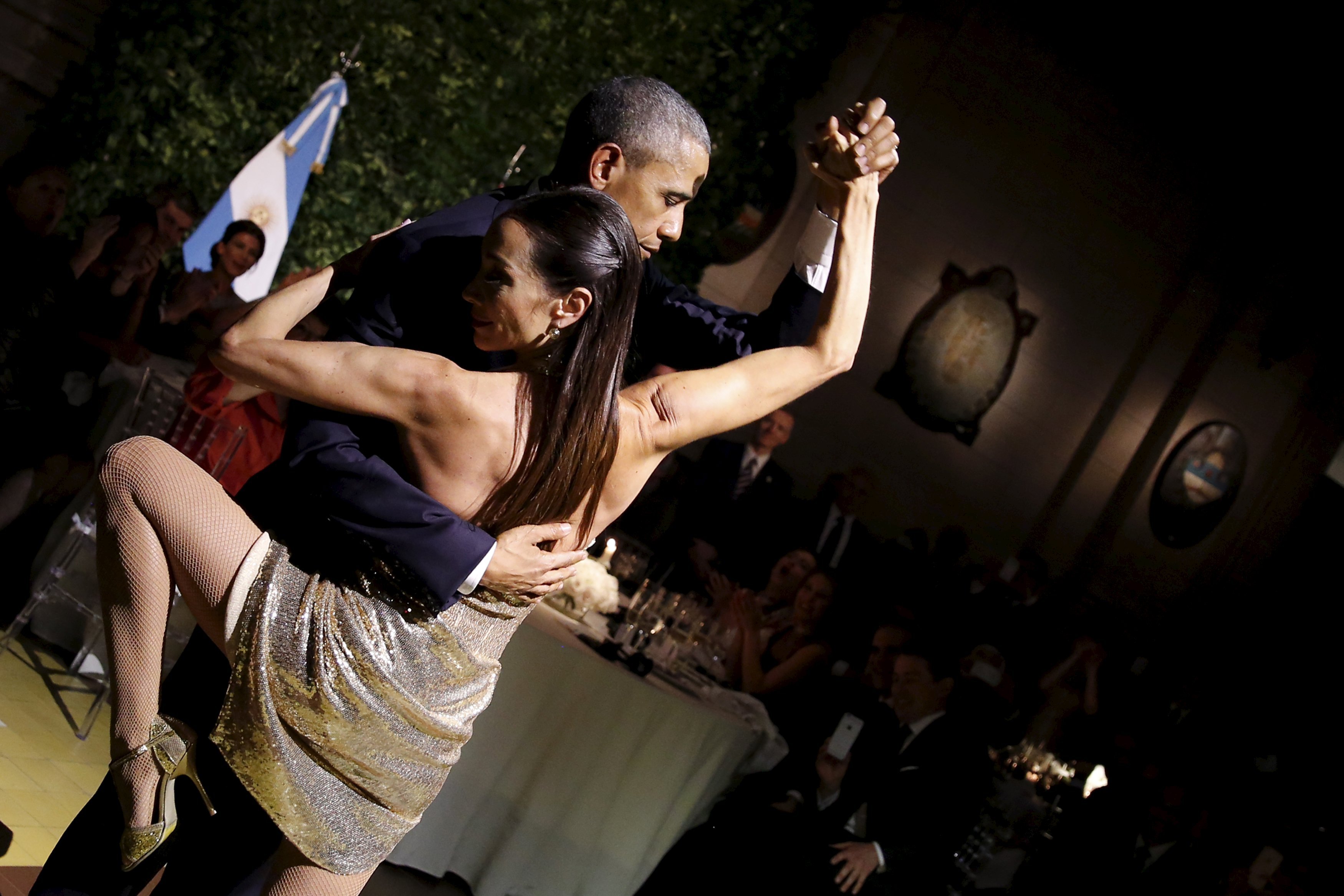 U.S. President Barack Obama dances tango during a state dinner hosted by Argentina's President Mauricio Macri at the Centro Cultural Kirchner as part of President Obama's two-day visit to Argentina, in Buenos Aires on March 23, 2016.