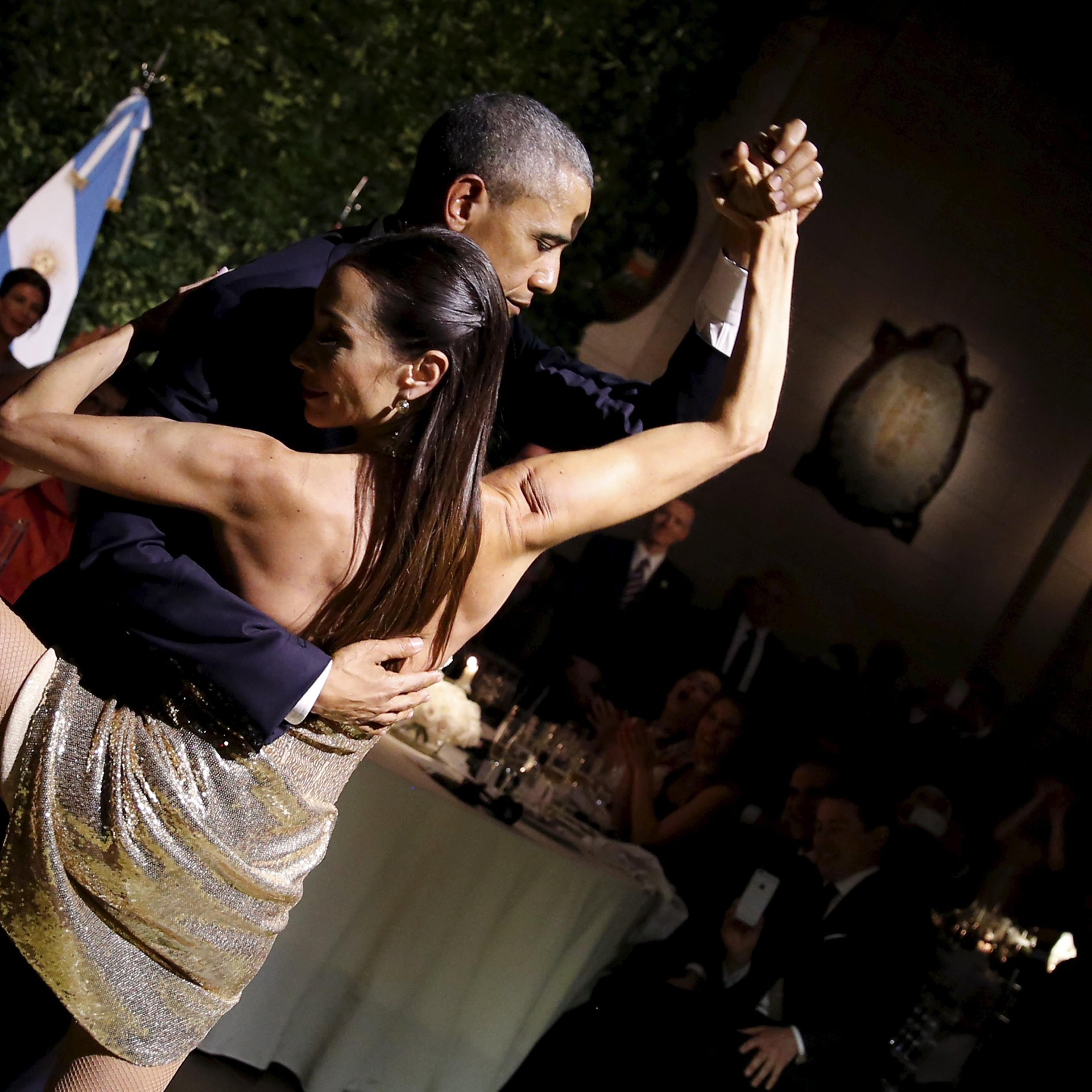 U.S. President Barack Obama dances tango during a state dinner hosted by Argentina's President Mauricio Macri at the Centro Cultural Kirchner as part of President Obama's two-day visit to Argentina, in Buenos Aires on March 23, 2016.