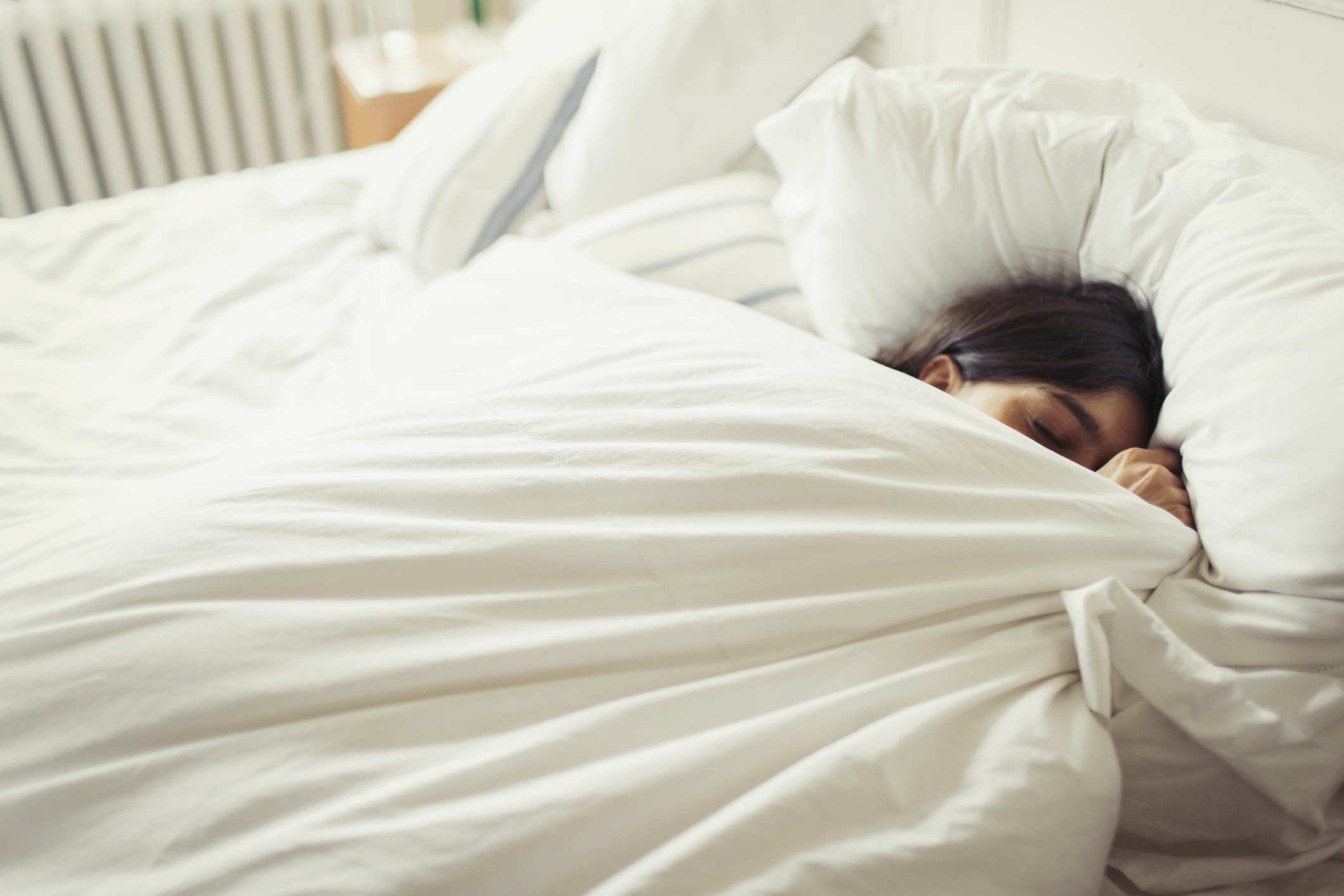 Young woman catching up on sleep