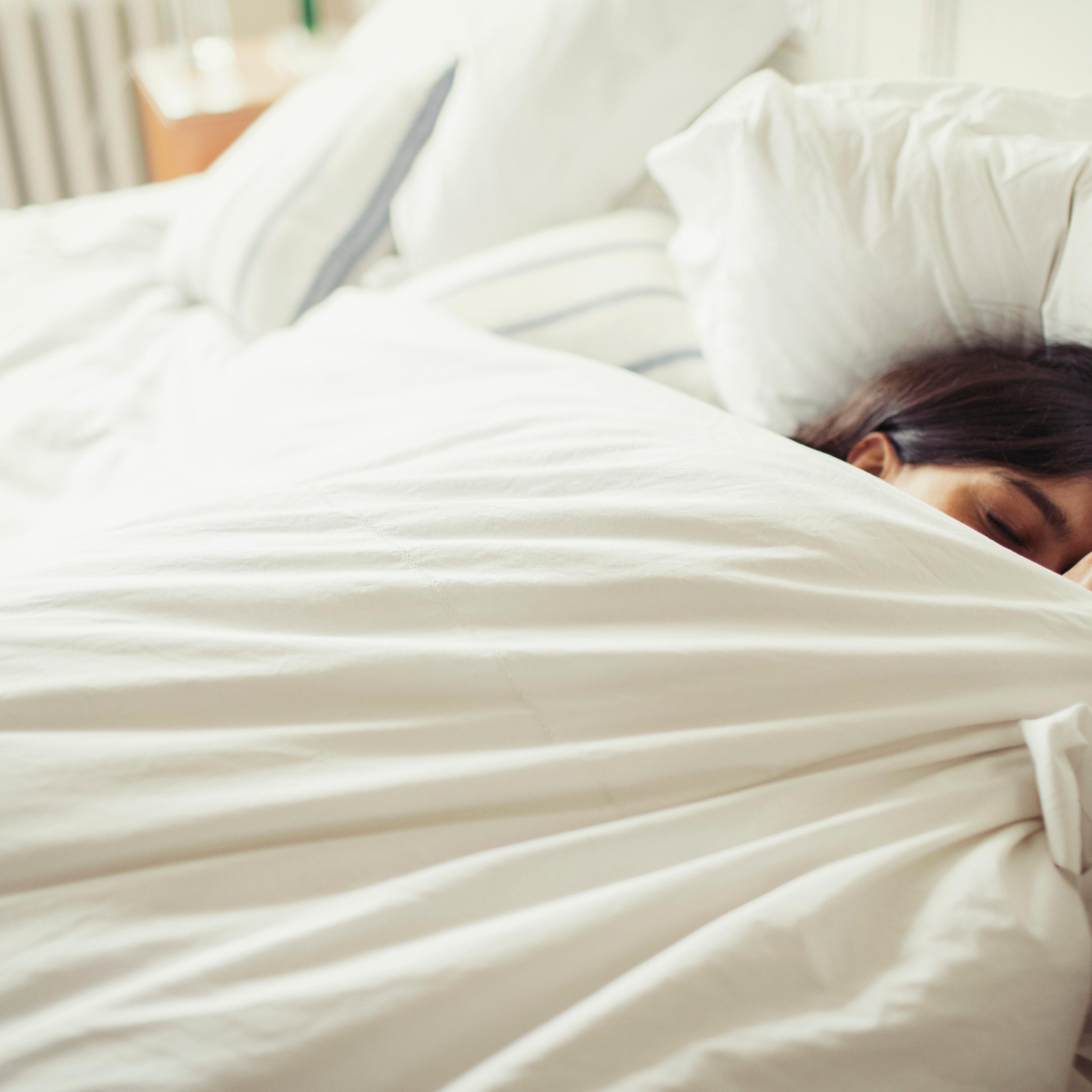 Young woman catching up on sleep