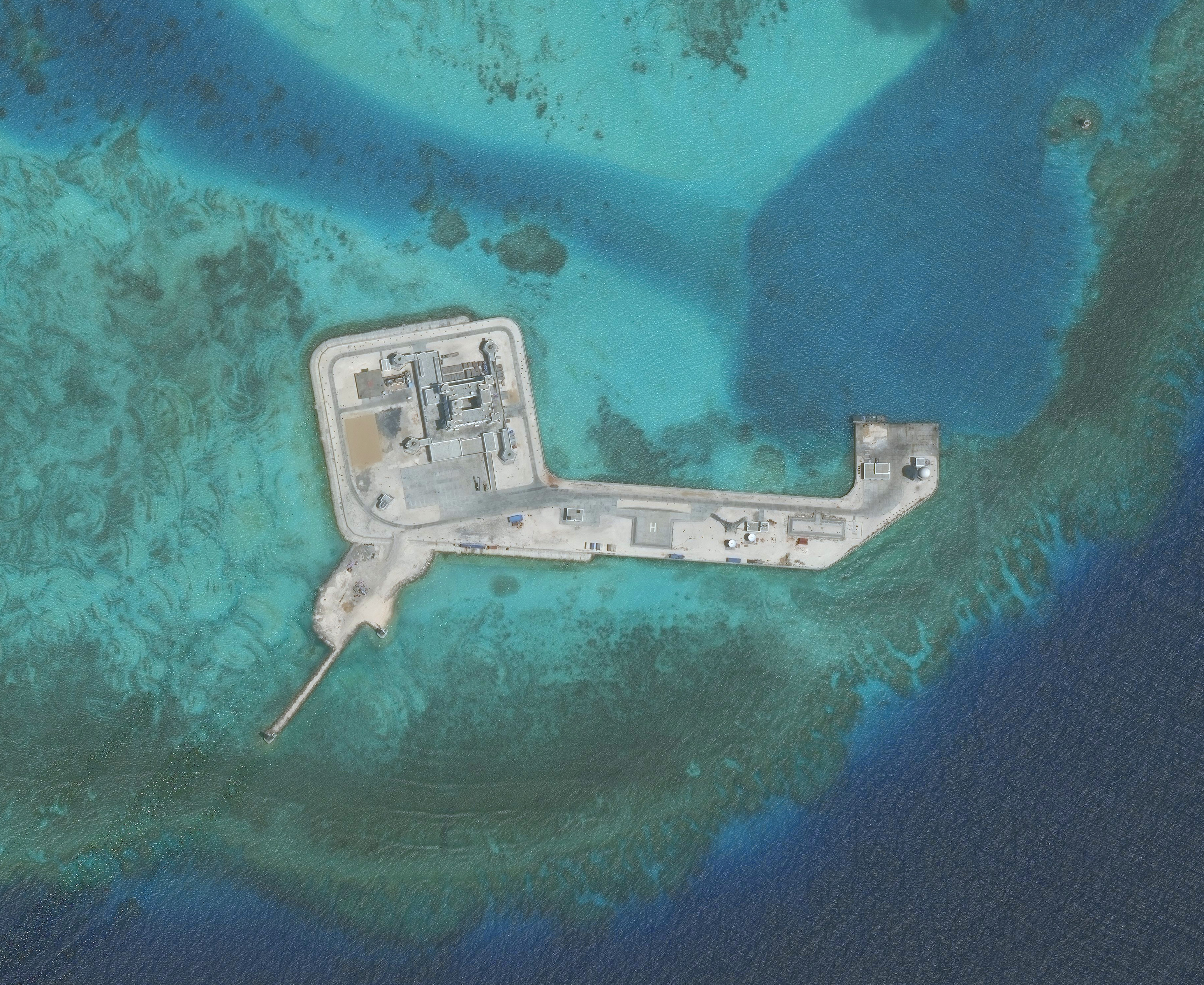 DigitalGlobe closeup imagery of one of the Hughes Reef.  The Hughes Reef is located in the Union banks area within the Spratly group of islands in the South China Sea.