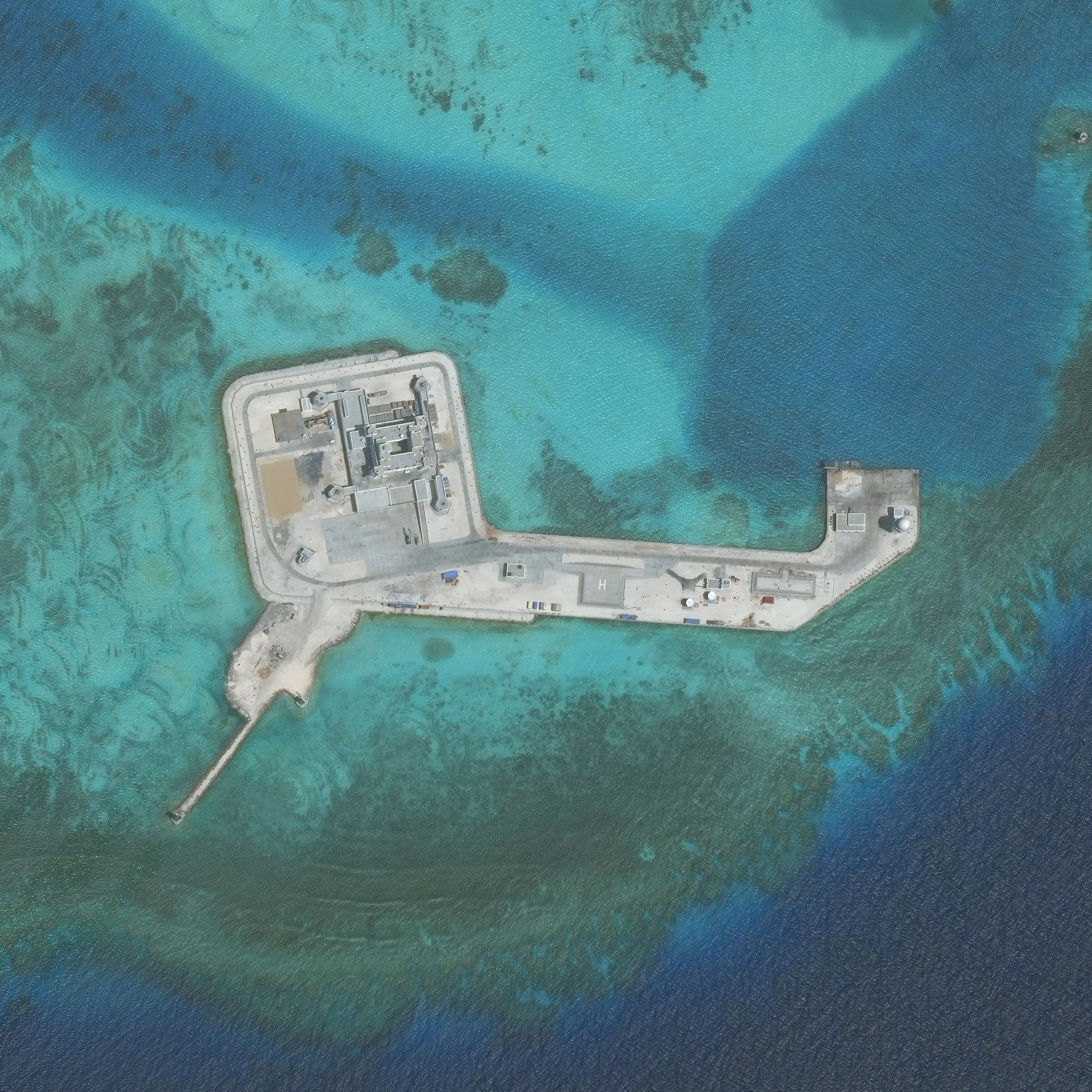 DigitalGlobe closeup imagery of one of the Hughes Reef. The Hughes Reef is located in the Union banks area within the Spratly group of islands in the South China Sea.