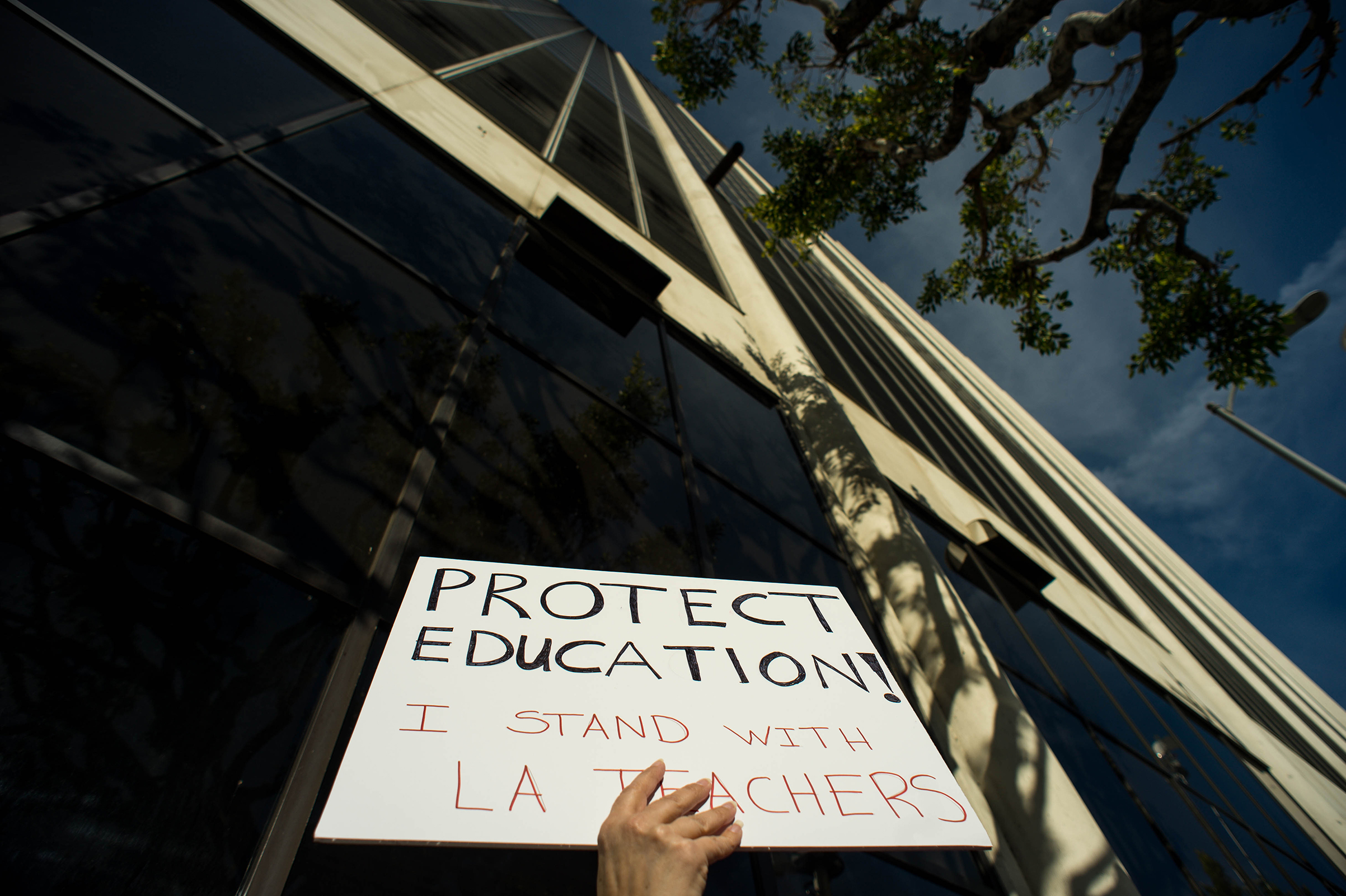"I'm advocating for my children and I believe in what the teachers are asking for will benefit my children so I support my teachers," says Los Angeles Unified School District parent Kristie Vogel as she waits to get into the LAUSD School Board meeting in