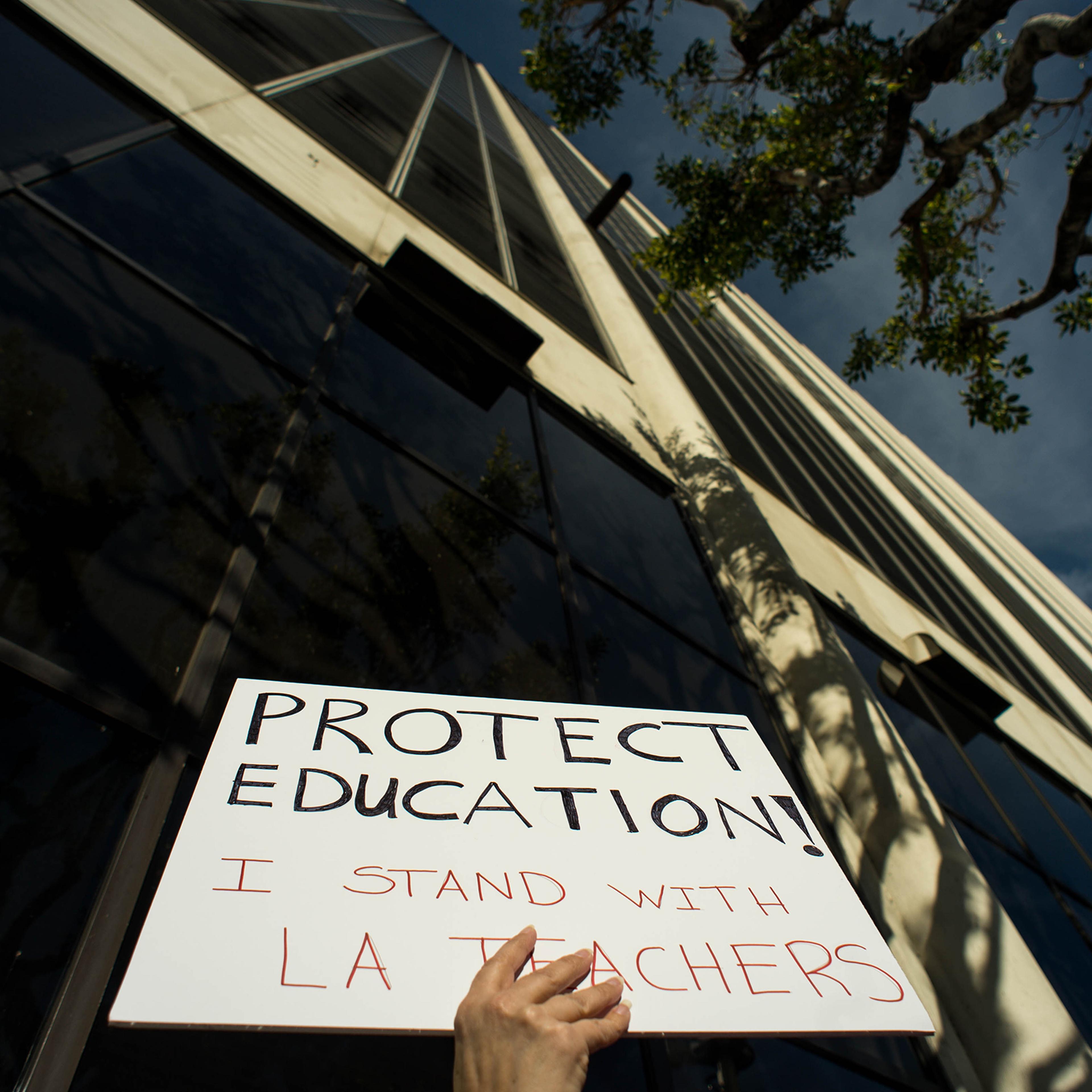 "I'm advocating for my children and I believe in what the teachers are asking for will benefit my children so I support my teachers," says Los Angeles Unified School District parent Kristie Vogel as she waits to get into the LAUSD School Board meeting in
