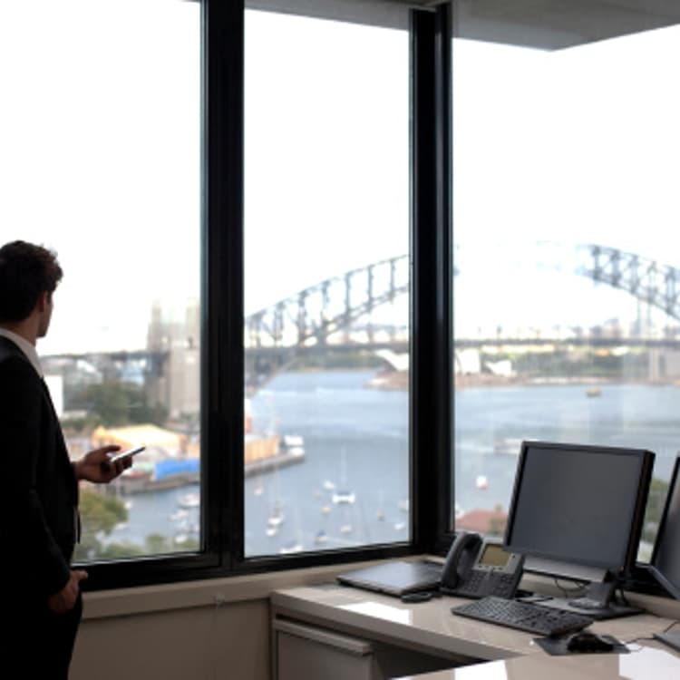 businessman-looking-out-window