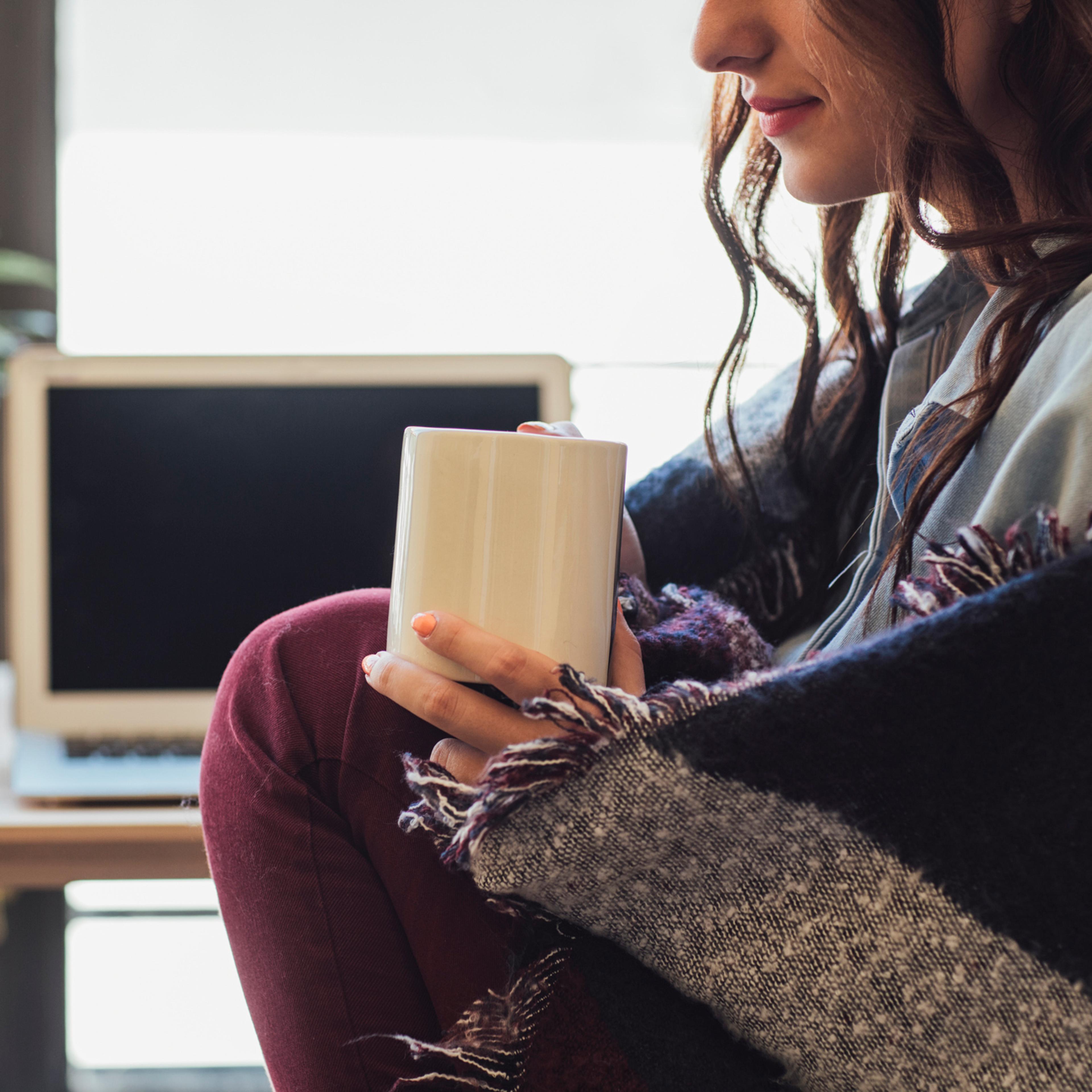 Woman working in a cold office