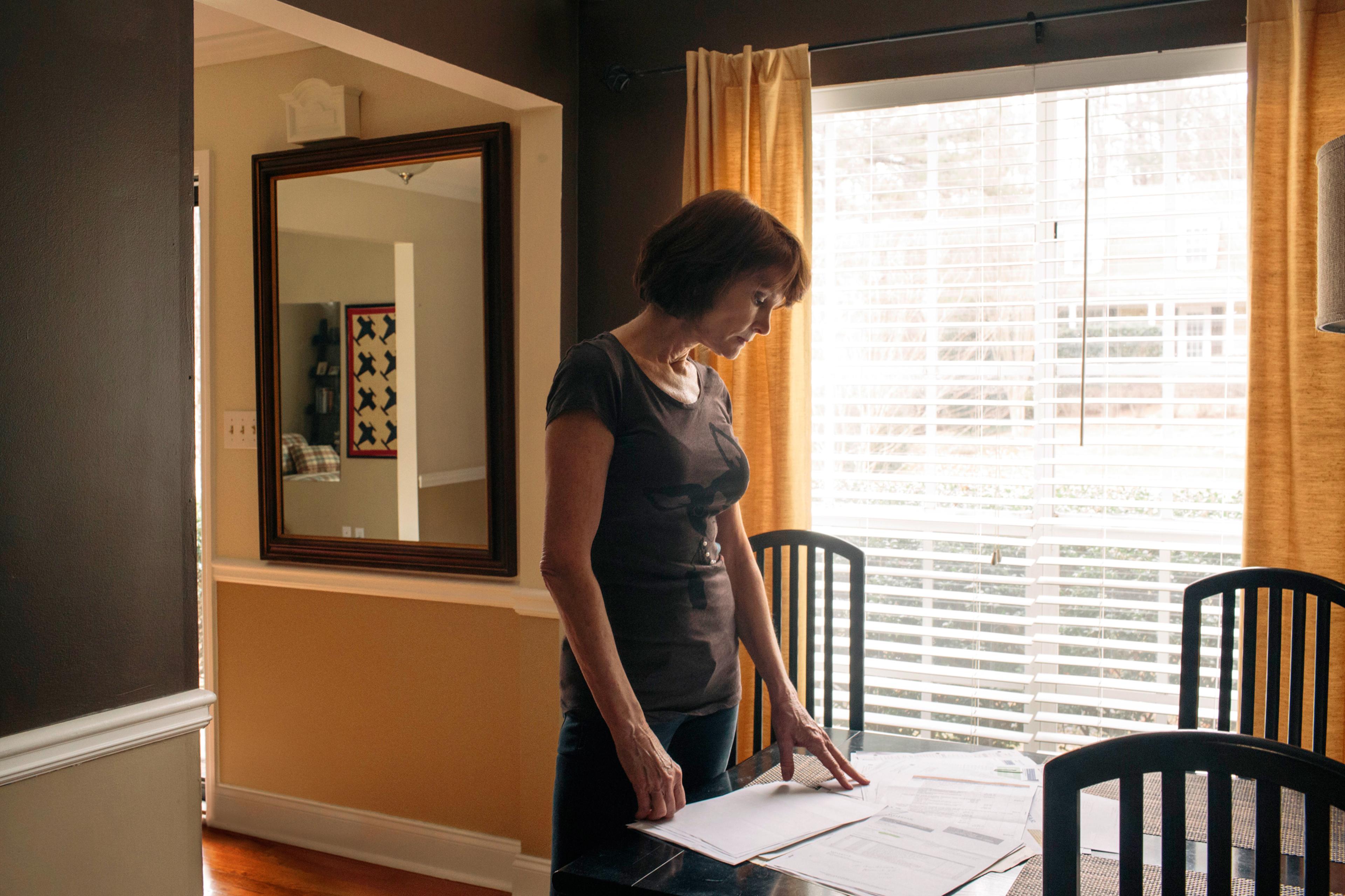 Elaine Hightower, a graphic designer, expects to pay an additional $12,600 in out-of-network bills for two arthritis surgeries