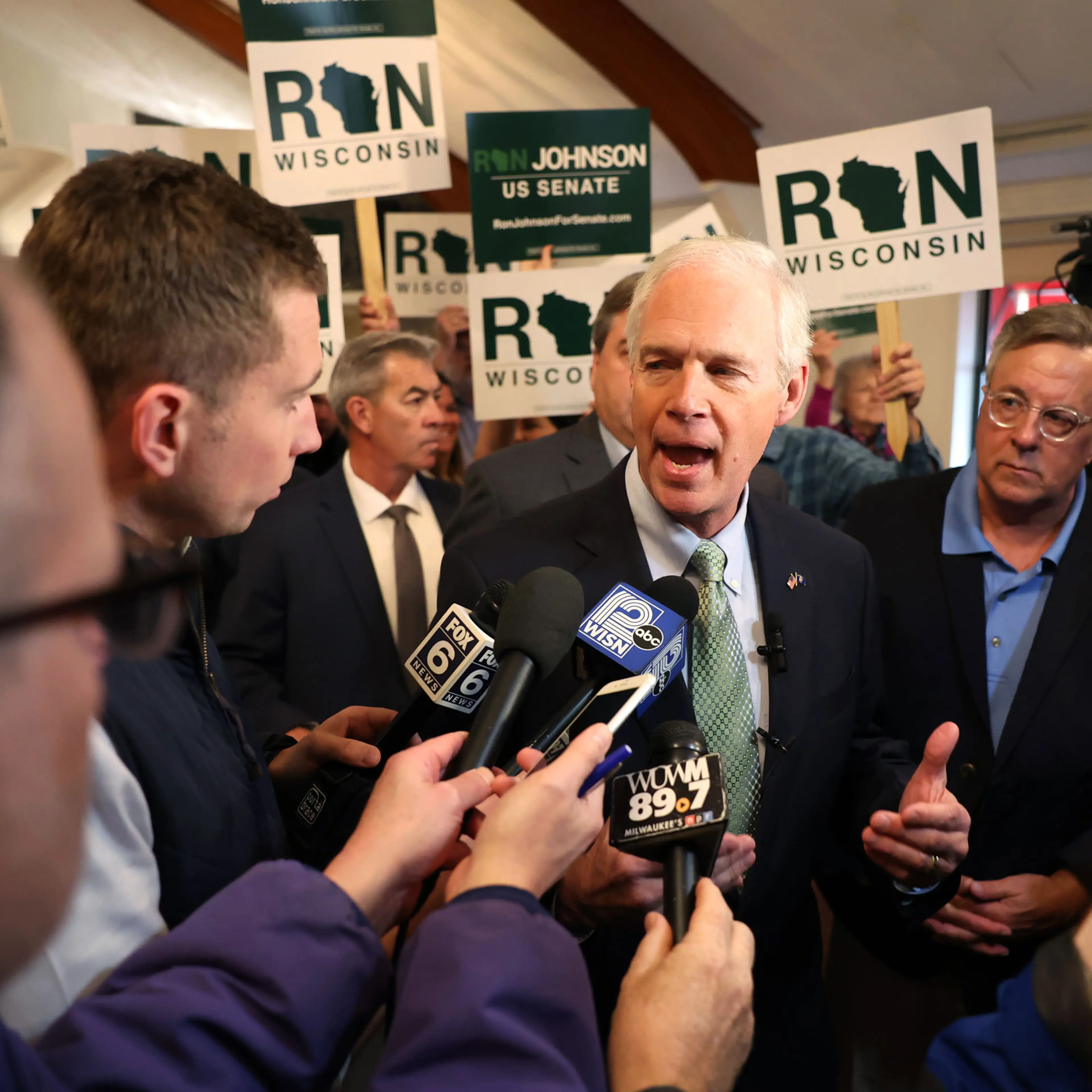 Sen. Ron Johnson speaks to reporters following a rally with supporters on Oct. 25, 2022 in Waukesha, Wisconsin.