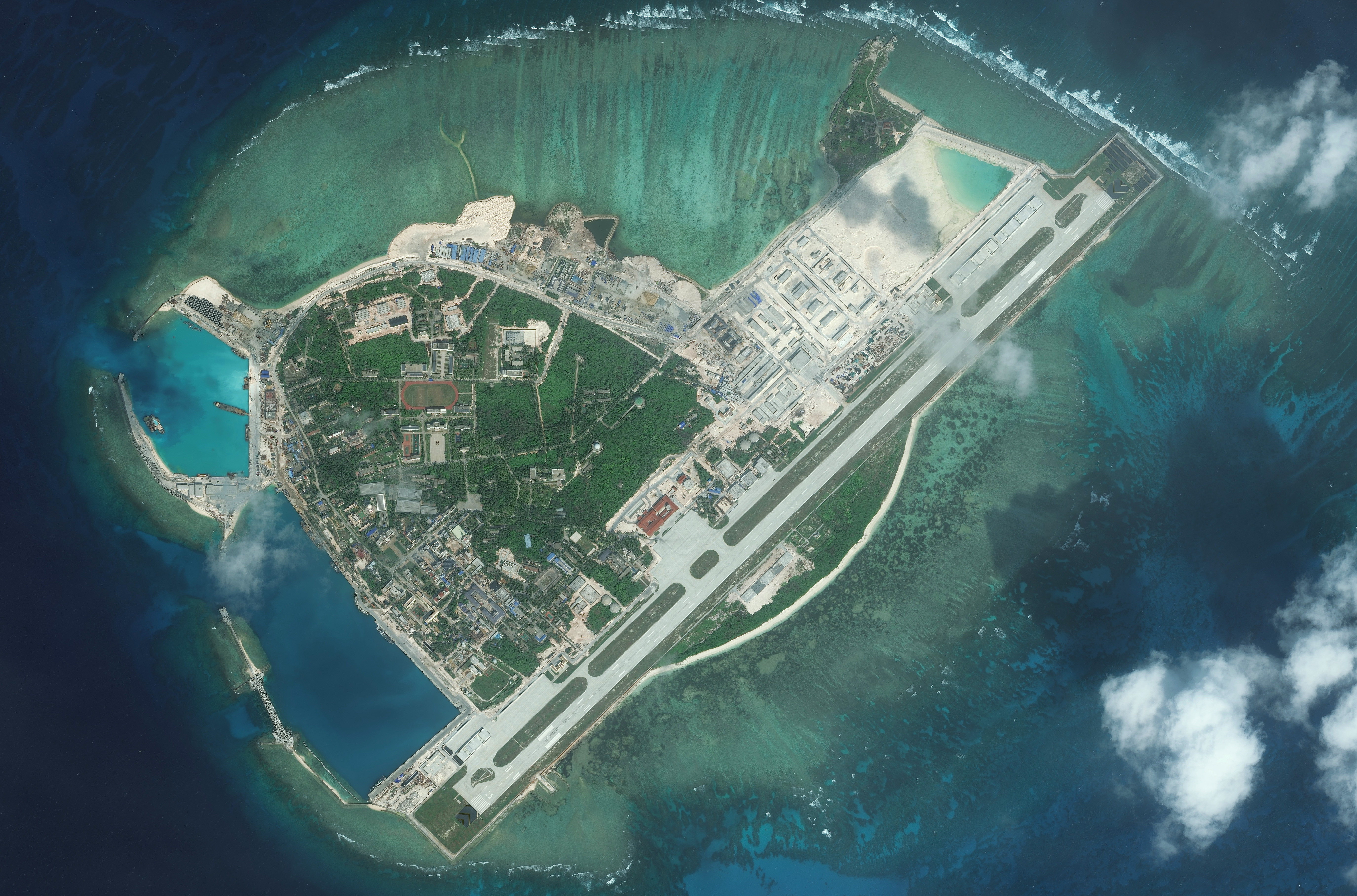 DigitalGlobe medium view imagery from 09 January 2016 of Woody Island.  Woody Island is also known as Yongxing Island and Phu Lam Island and is the largest of the Paracel Islands in the South China Sea.