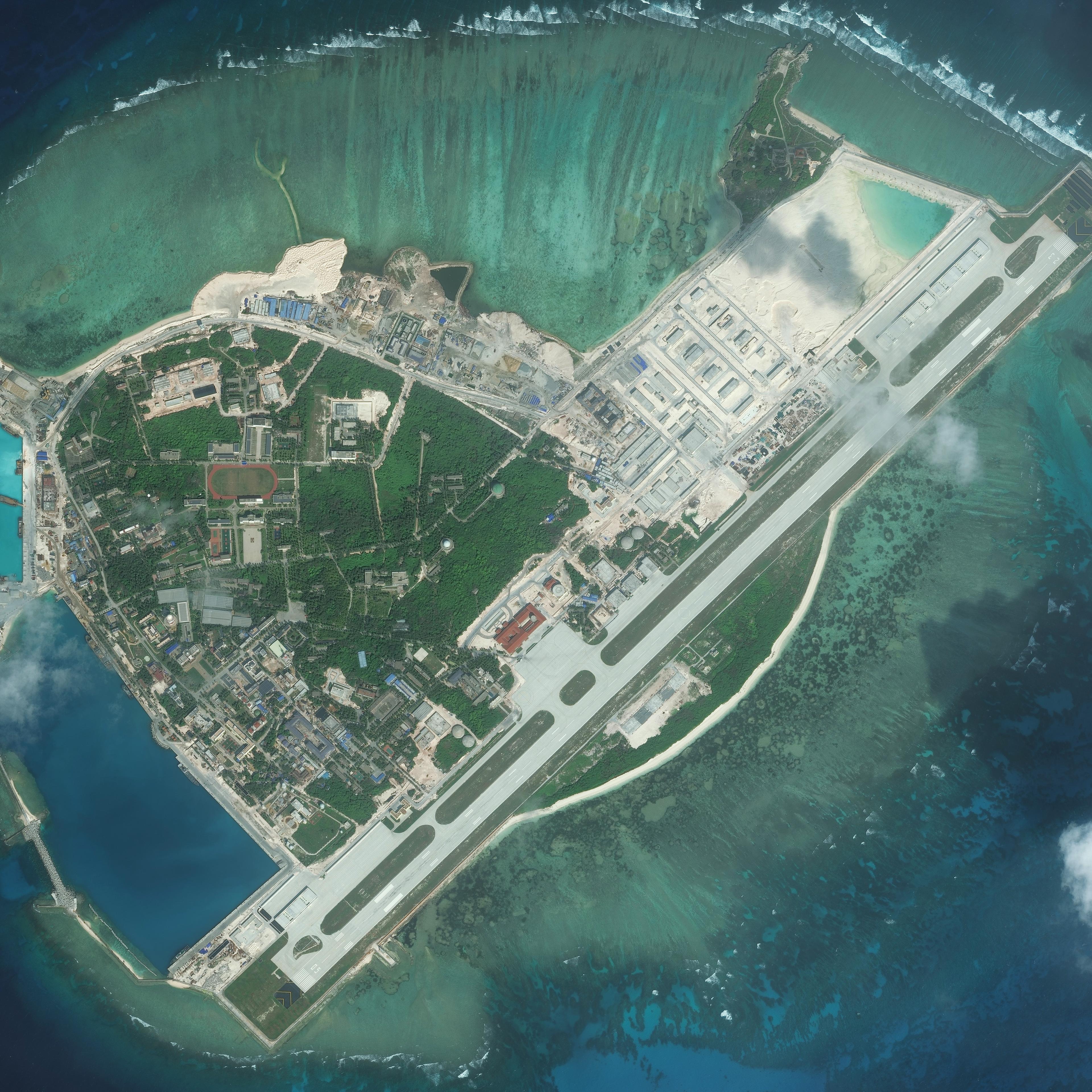 DigitalGlobe medium view imagery from 09 January 2016 of Woody Island. Woody Island is also known as Yongxing Island and Phu Lam Island and is the largest of the Paracel Islands in the South China Sea.