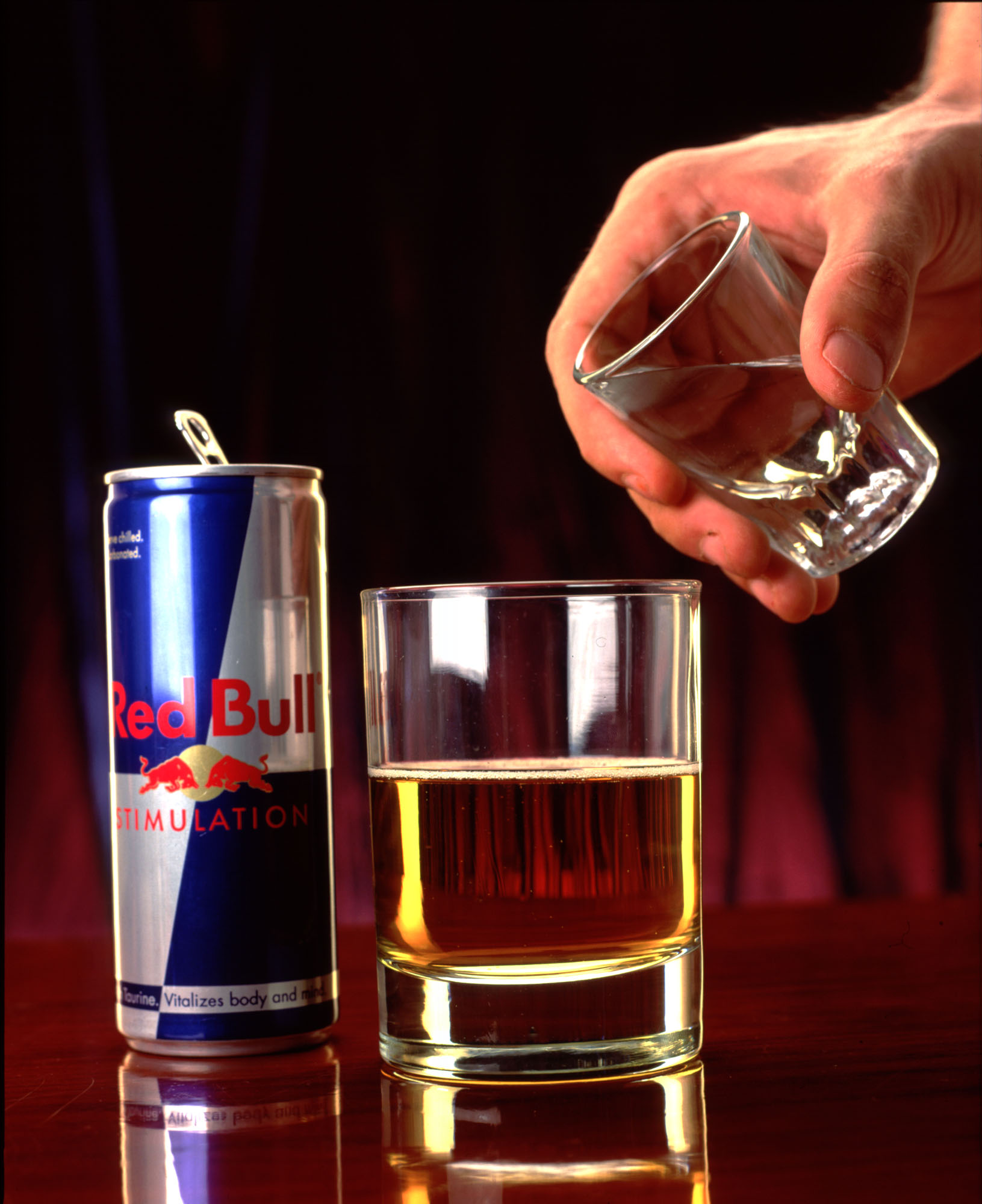 370699 02: A shot of vodka is poured into a "Red Bull" energy drink in this 1999 photo taken in Los Angeles, CA. The mixed drink keep club goers buzzed but wide awake while partying. They''re calling this beverage "ecstasy in a can." (Photo by Evan Kafka