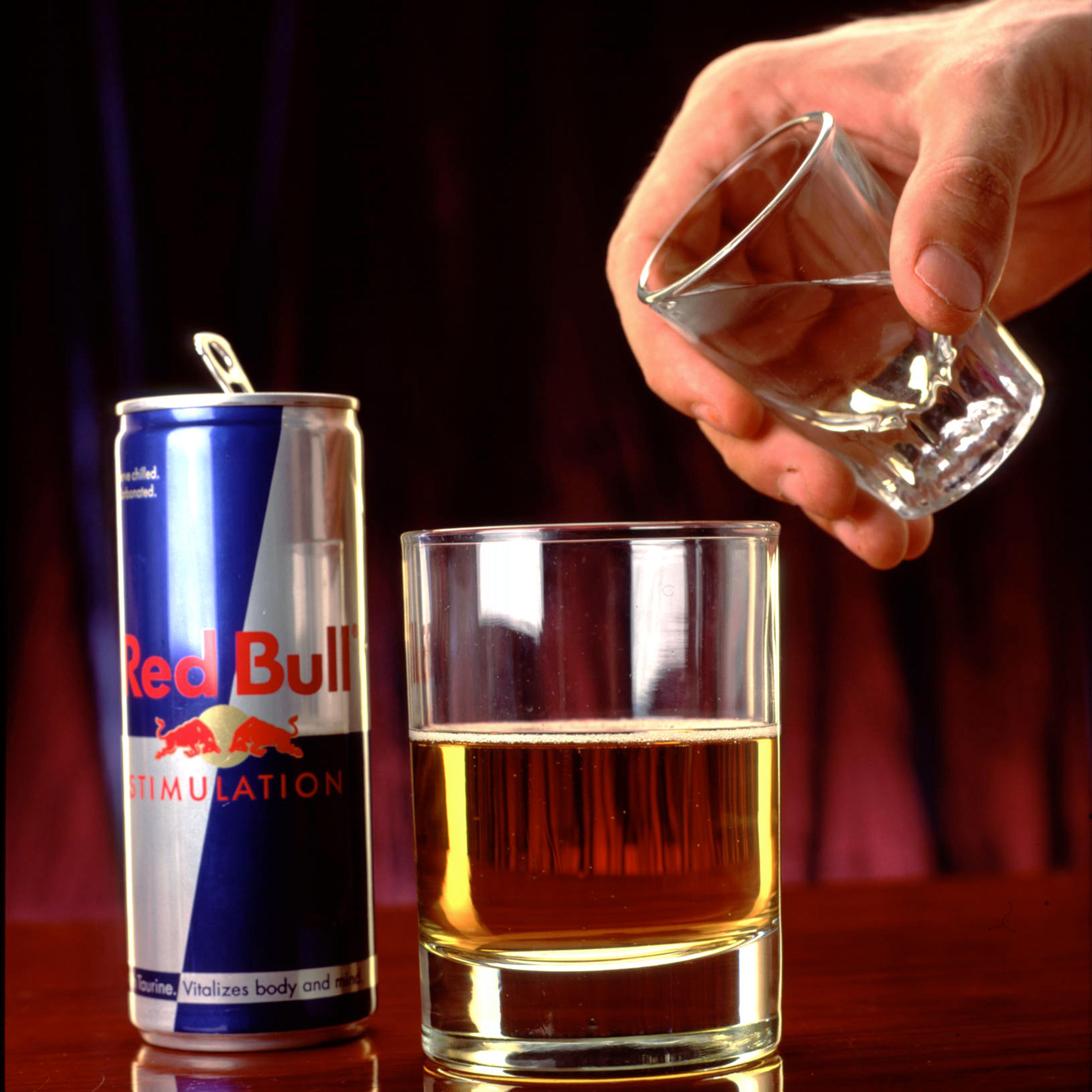 370699 02: A shot of vodka is poured into a "Red Bull" energy drink in this 1999 photo taken in Los Angeles, CA. The mixed drink keep club goers buzzed but wide awake while partying. They''re calling this beverage "ecstasy in a can." (Photo by Evan Kafka