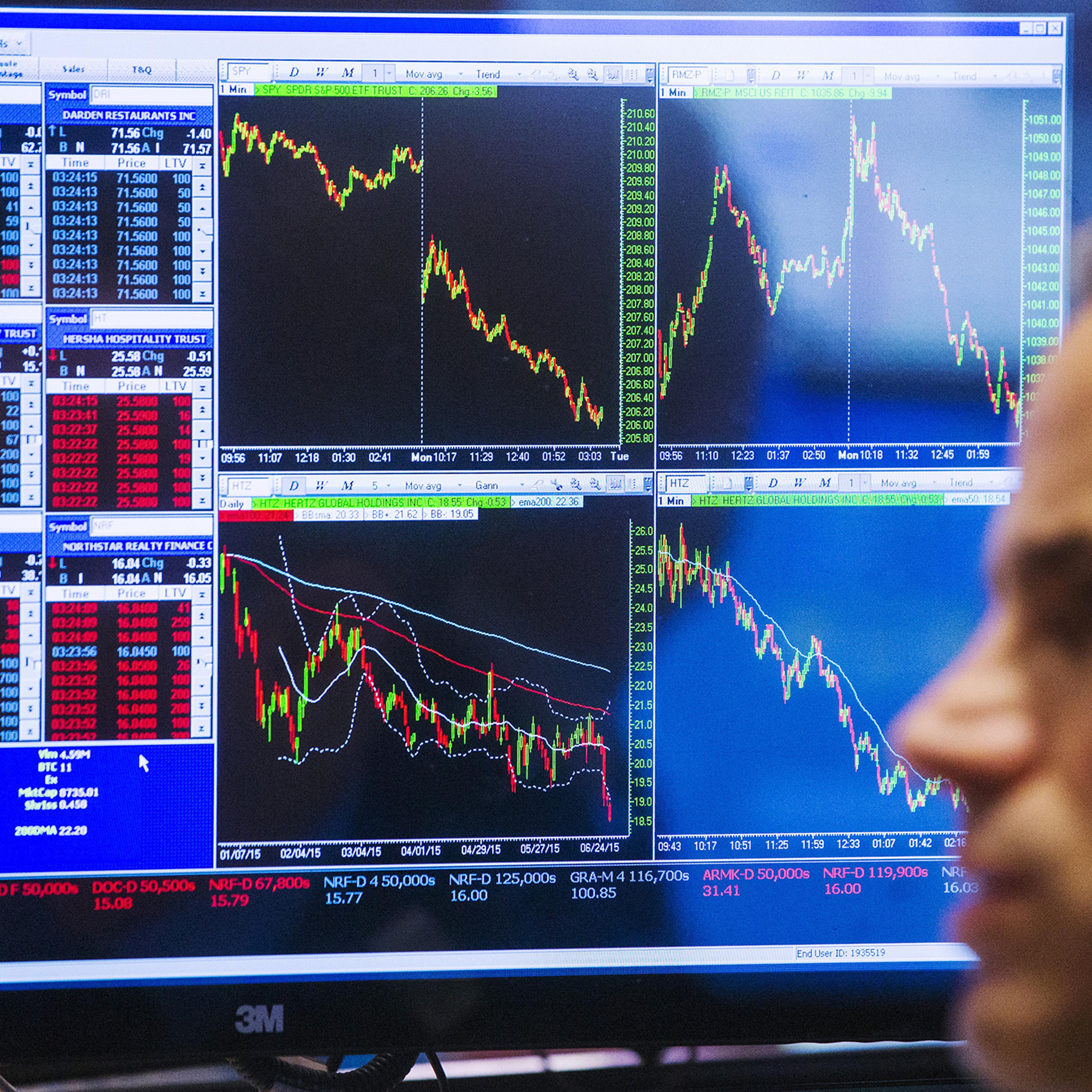 A trader works on the floor of the New York Stock Exchange shortly before the closing bell, June 29, 2015. U.S. stocks fell sharply in heavy trading on Monday and the S&P 500 and the Dow had their worst day since October after a collapse in Greek bailout
