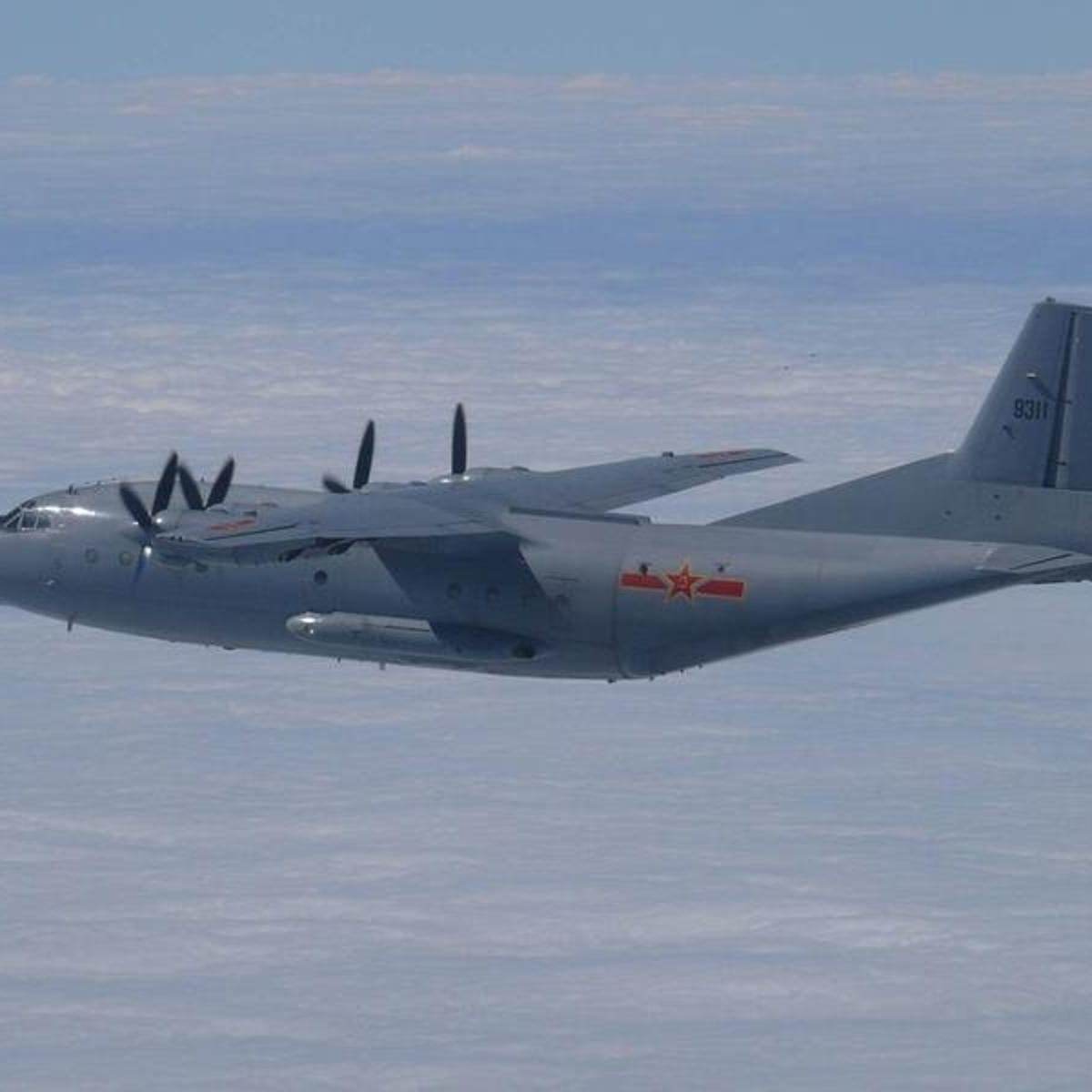 A Chinese military plane Y-8 airborne early warning plane flies through airspace between Okinawa prefecture's main island and the smaller Miyako island in southern Japan