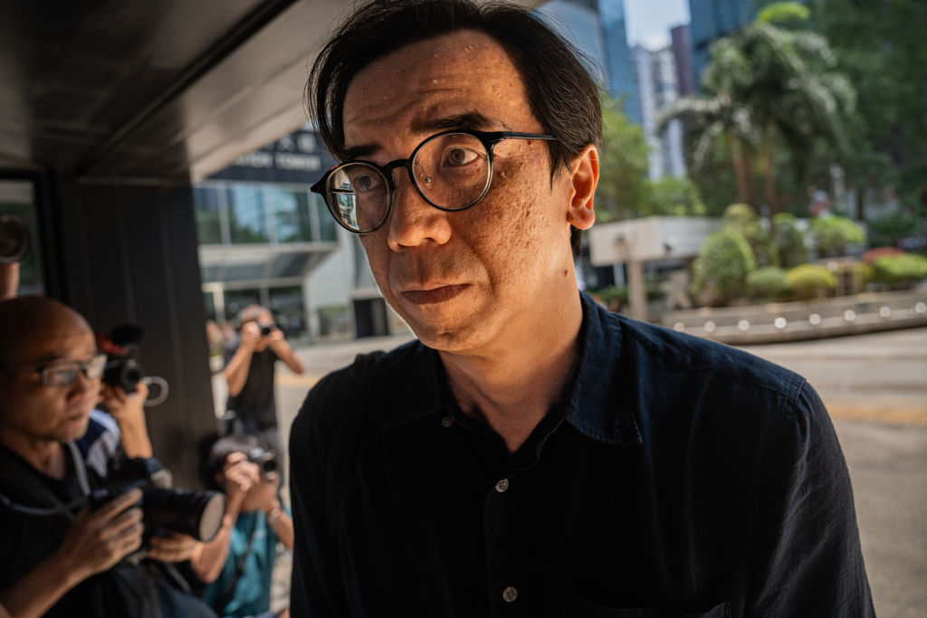 Former chief-editor of Stand News Chung Pui-kuen enters the Wanchai Law Courts ahead of a verdict for Hong Kong Stand News sedition trial in Hong Kong, China, on August 29, 2024.