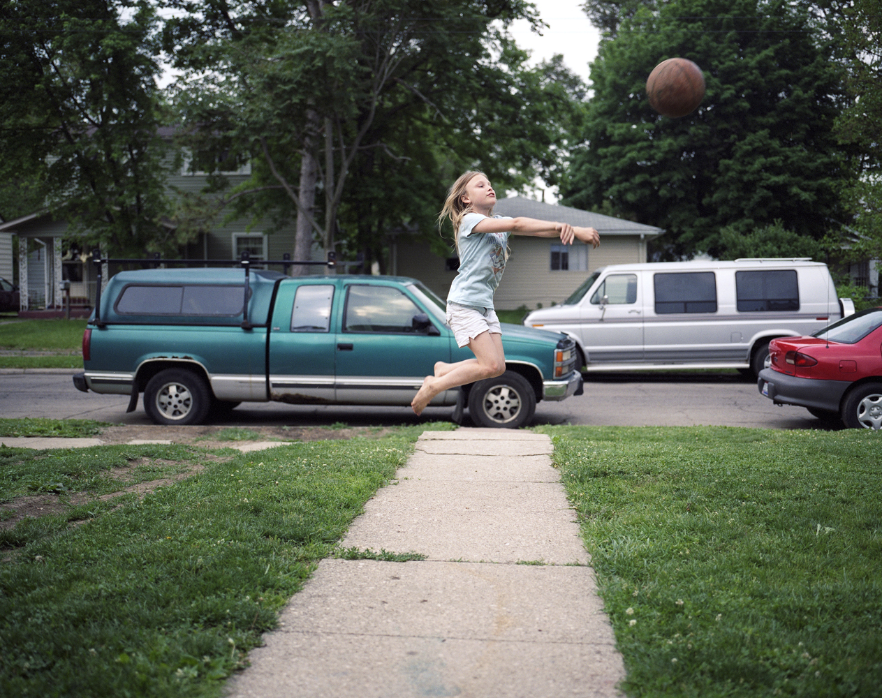 Playing basketball in the frontyard.  2009 