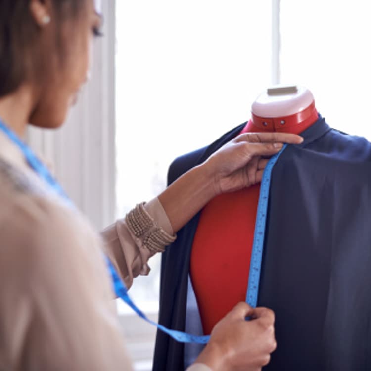 woman-using-tape-measure