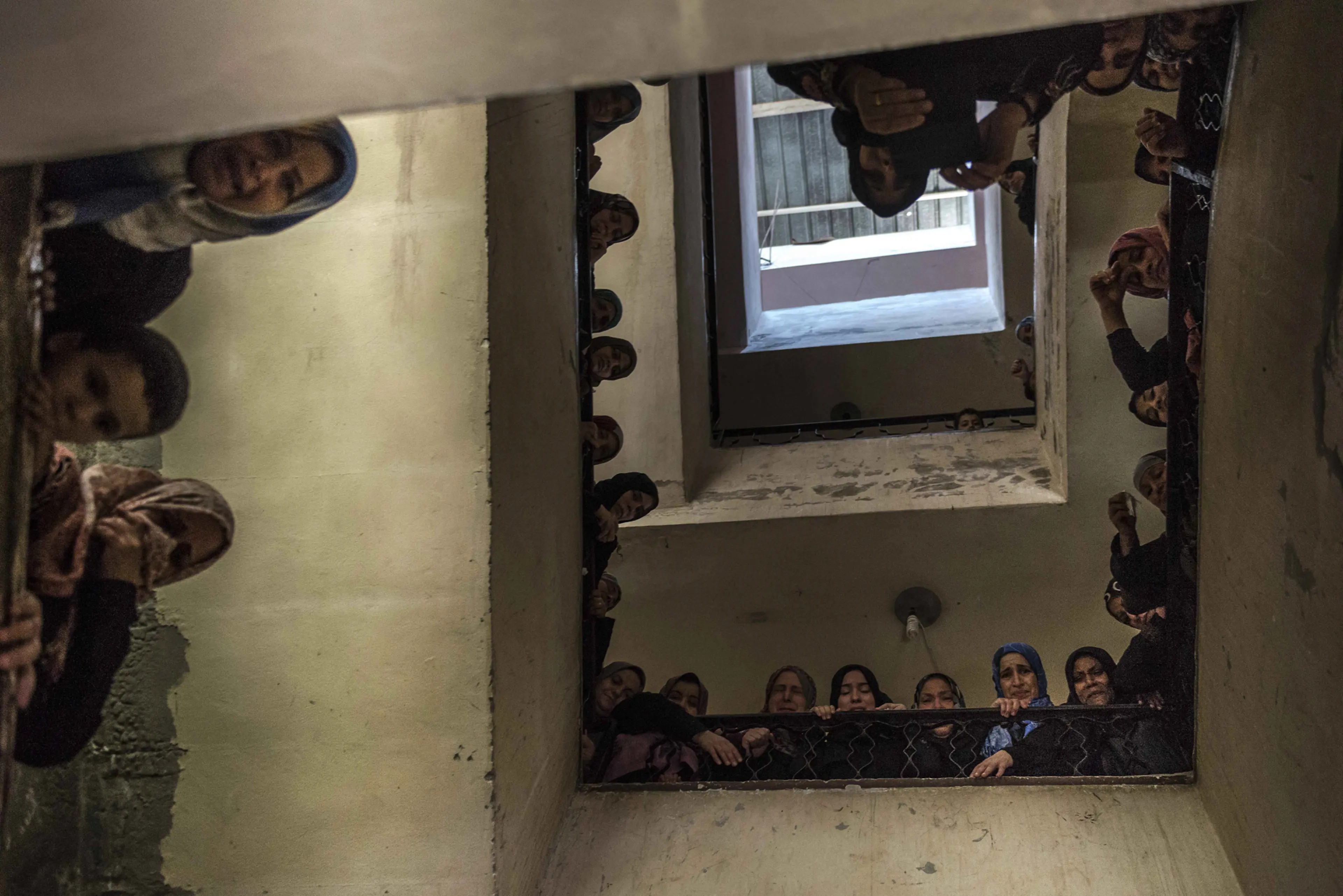 Women grieve during the funeral of Islamic Brigades fighter Abdalla Ismail al Buheisi, in Deir Al Balah, on the Gaza Strip.