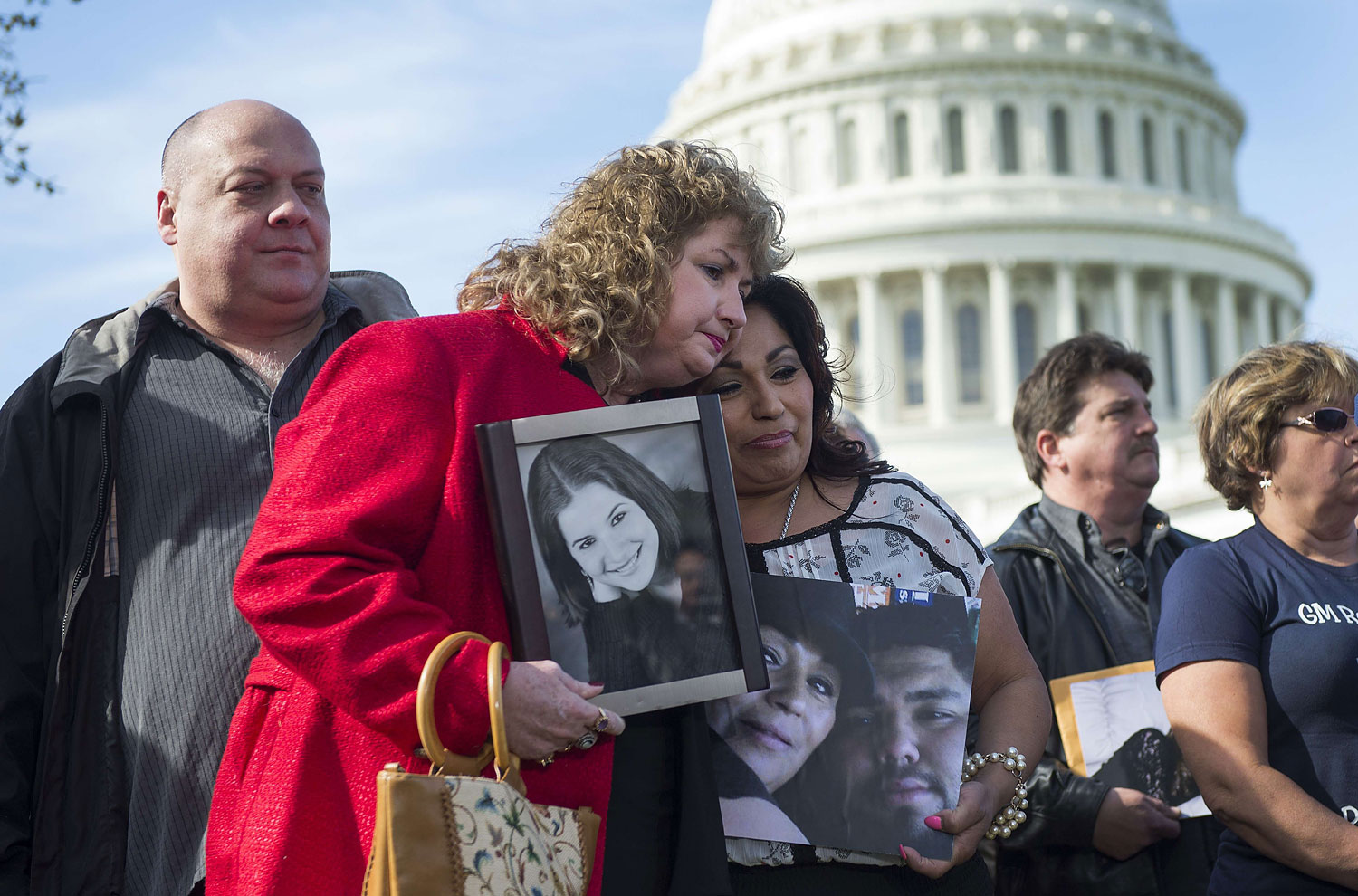 Mary Ruddy, whose daughter Kelly died in the crash of a 2005 Chevy Cobalt, hugs Rosie Cortinas, whose son Amador died in the crash of a 2005 Chevy Cobalt as well, during a press conference with the family members of deceased drivers on Capitol Hill in Wa