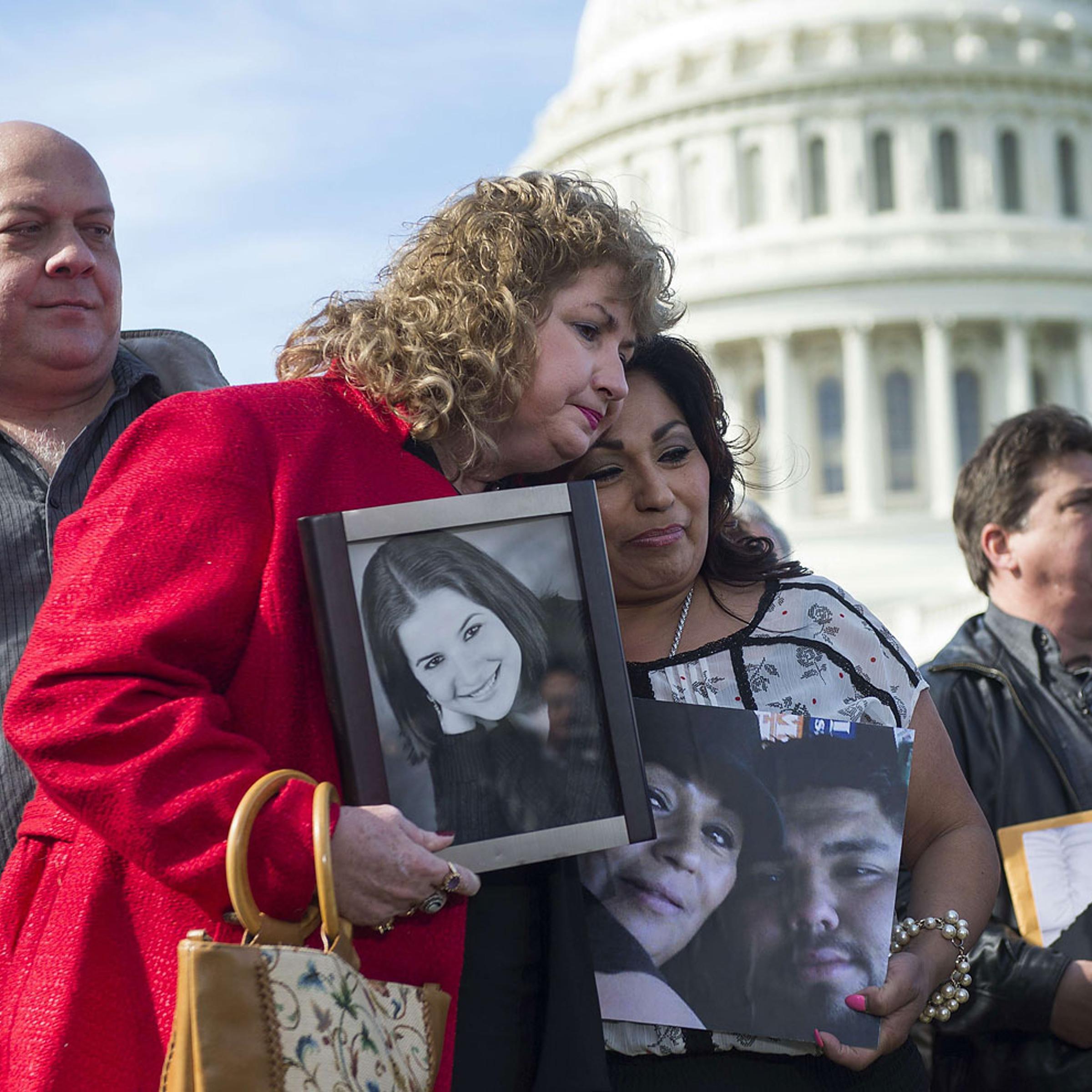 Mary Ruddy, whose daughter Kelly died in the crash of a 2005 Chevy Cobalt, hugs Rosie Cortinas, whose son Amador died in the crash of a 2005 Chevy Cobalt as well, during a press conference with the family members of deceased drivers on Capitol Hill in Wa