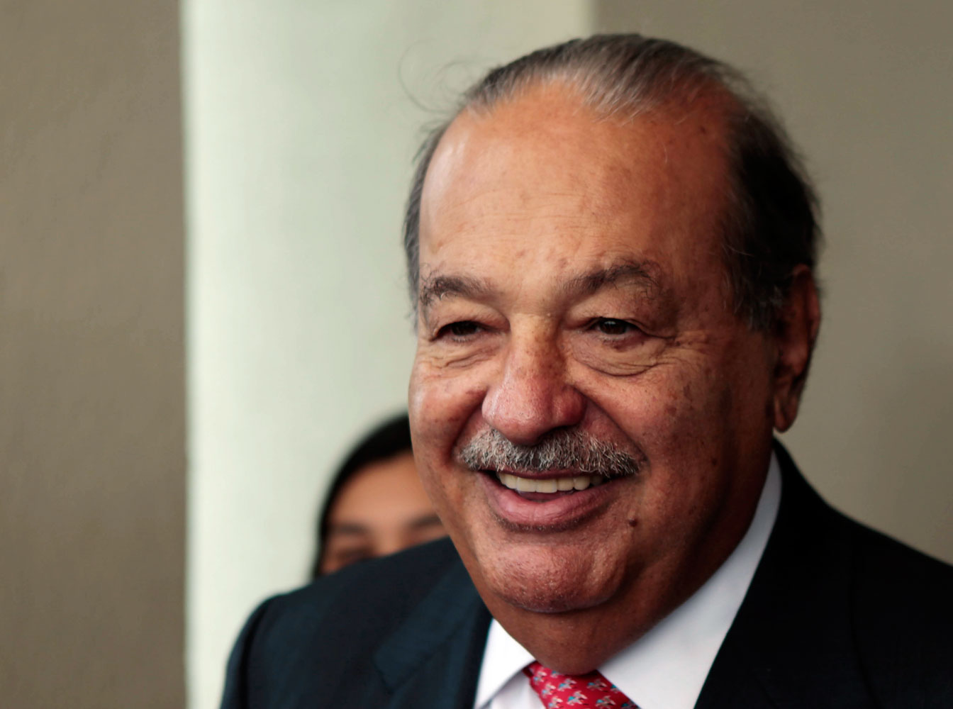 Mexican businessman Slim attends the media after talking in the 20th annual meeting of the Circulo de Montevideo Fundation in Luque