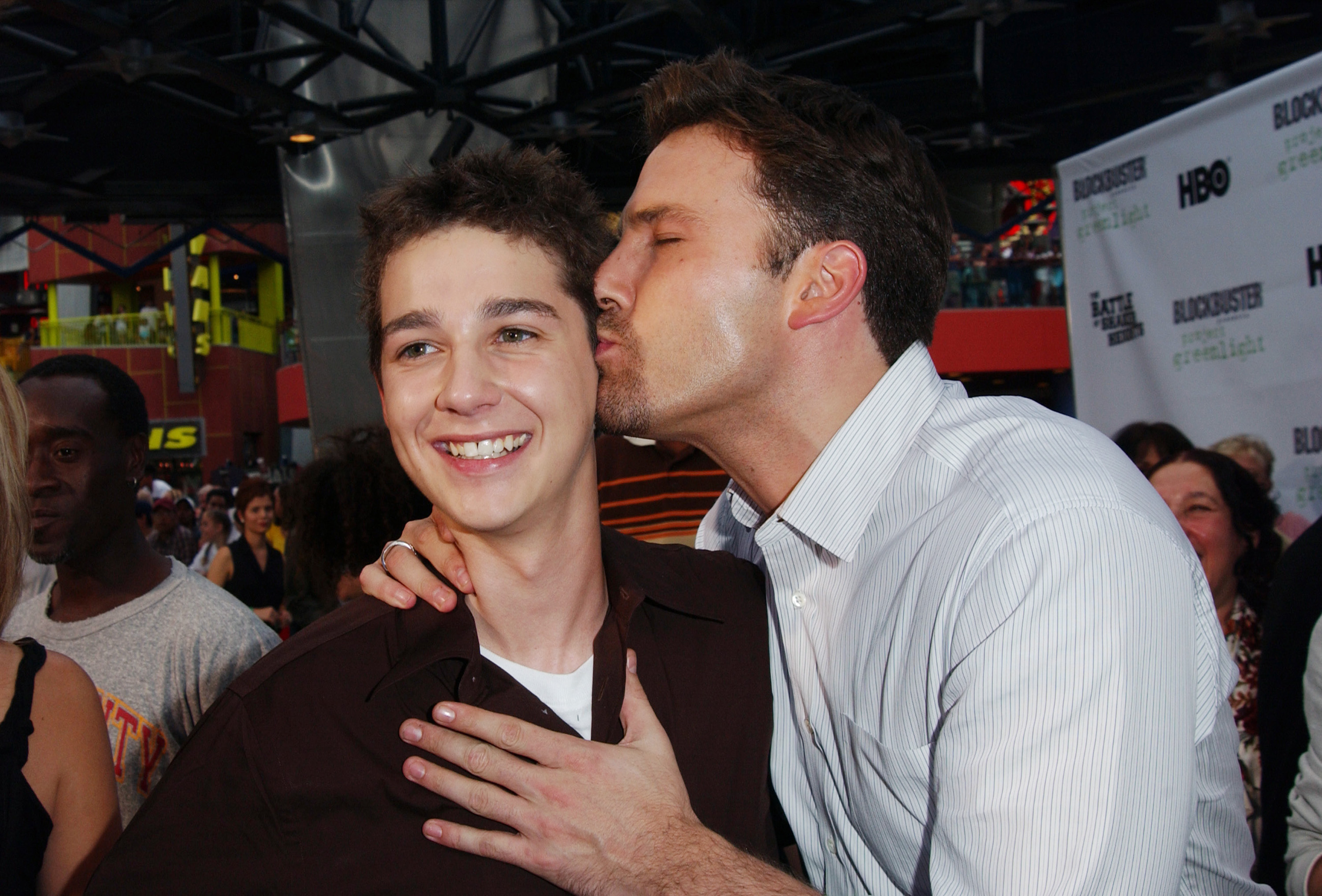 Ben Affleck kisses Shia Labeouf.