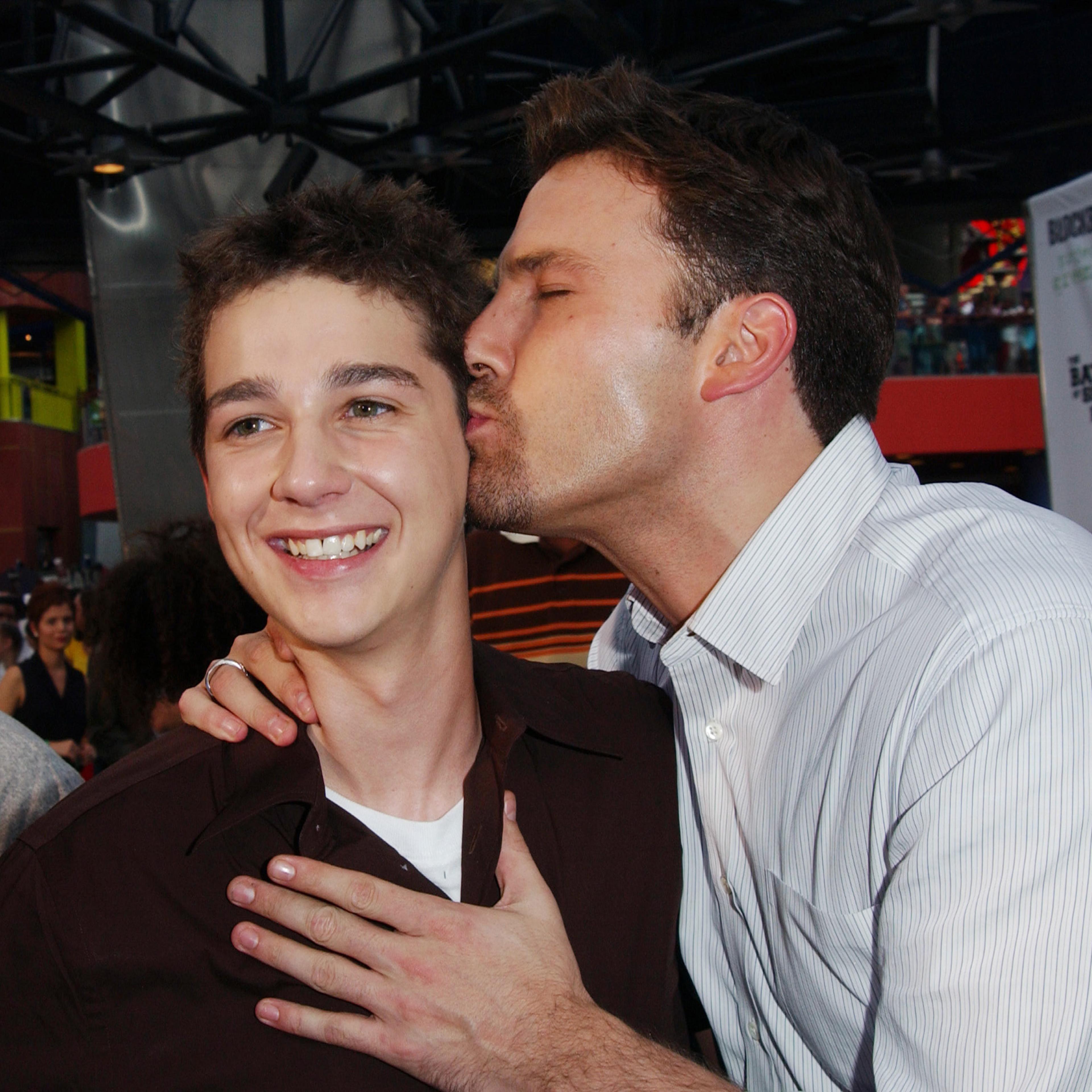 Ben Affleck kisses Shia Labeouf.