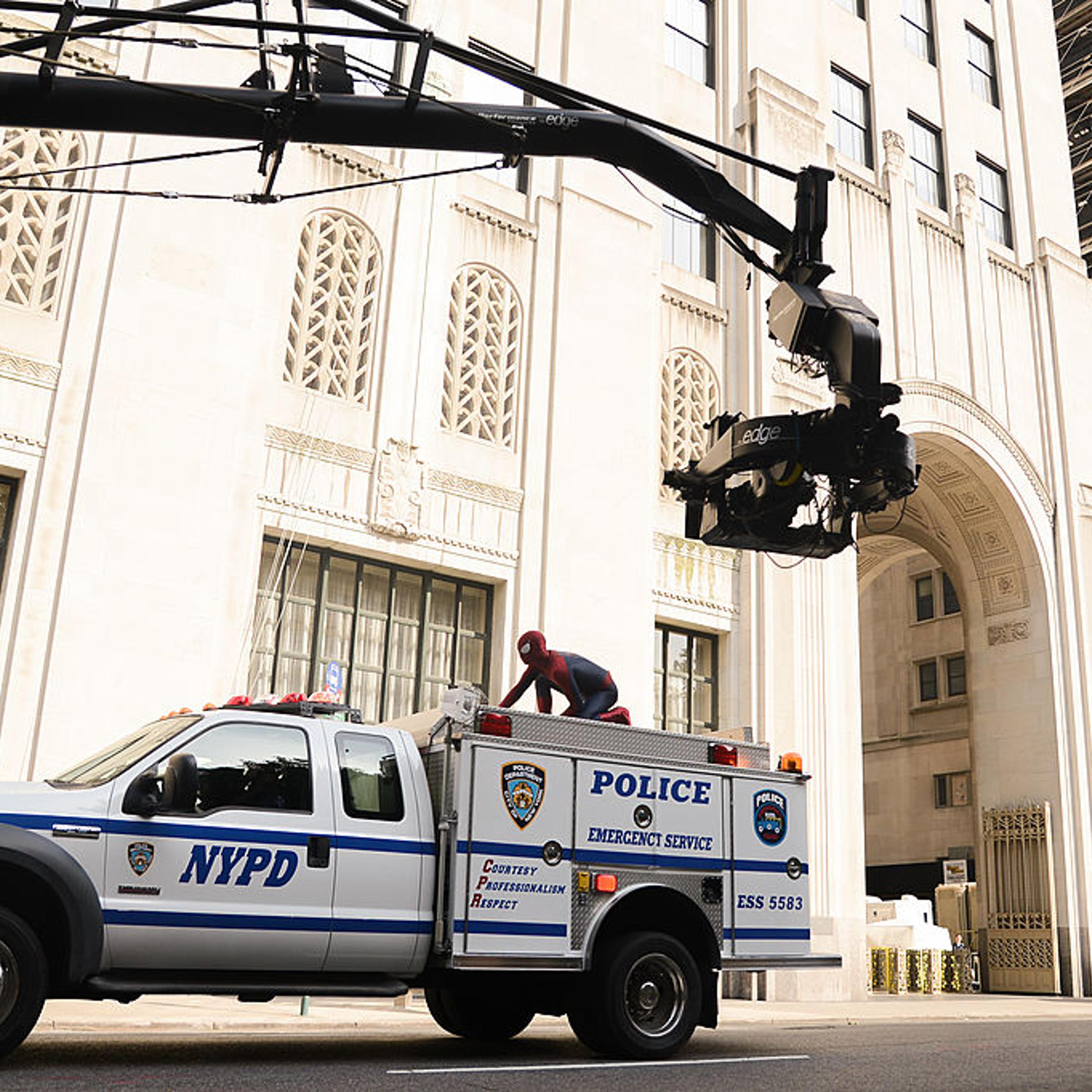 Actor Andrew Garfield films a scene at "The Amazing Spiderman 2" movie set in Madison Square Park on June 22, 2013 in New York City.