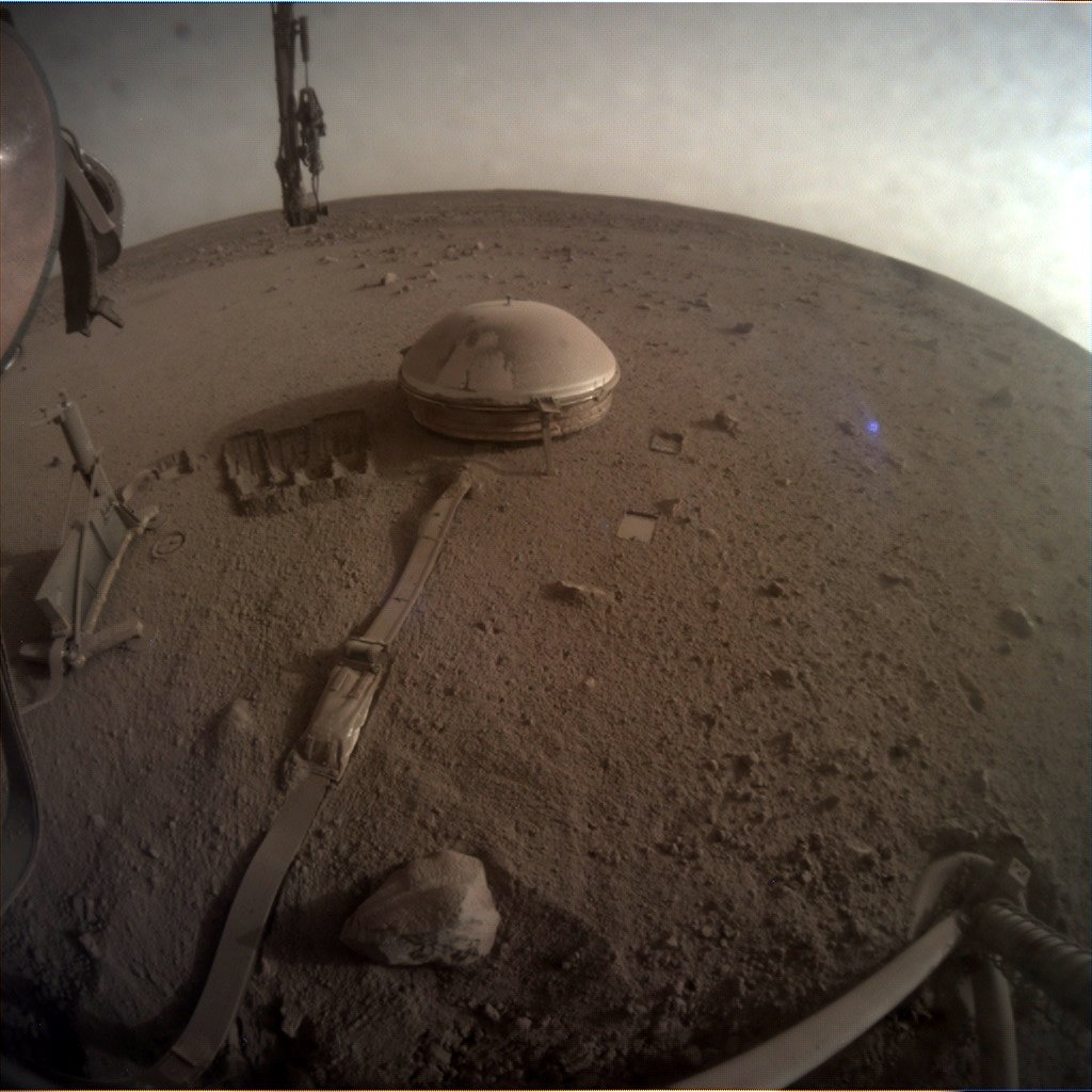 InSight's last picture from Mars shows its dome-shaped seismometer and the surrounding landscape