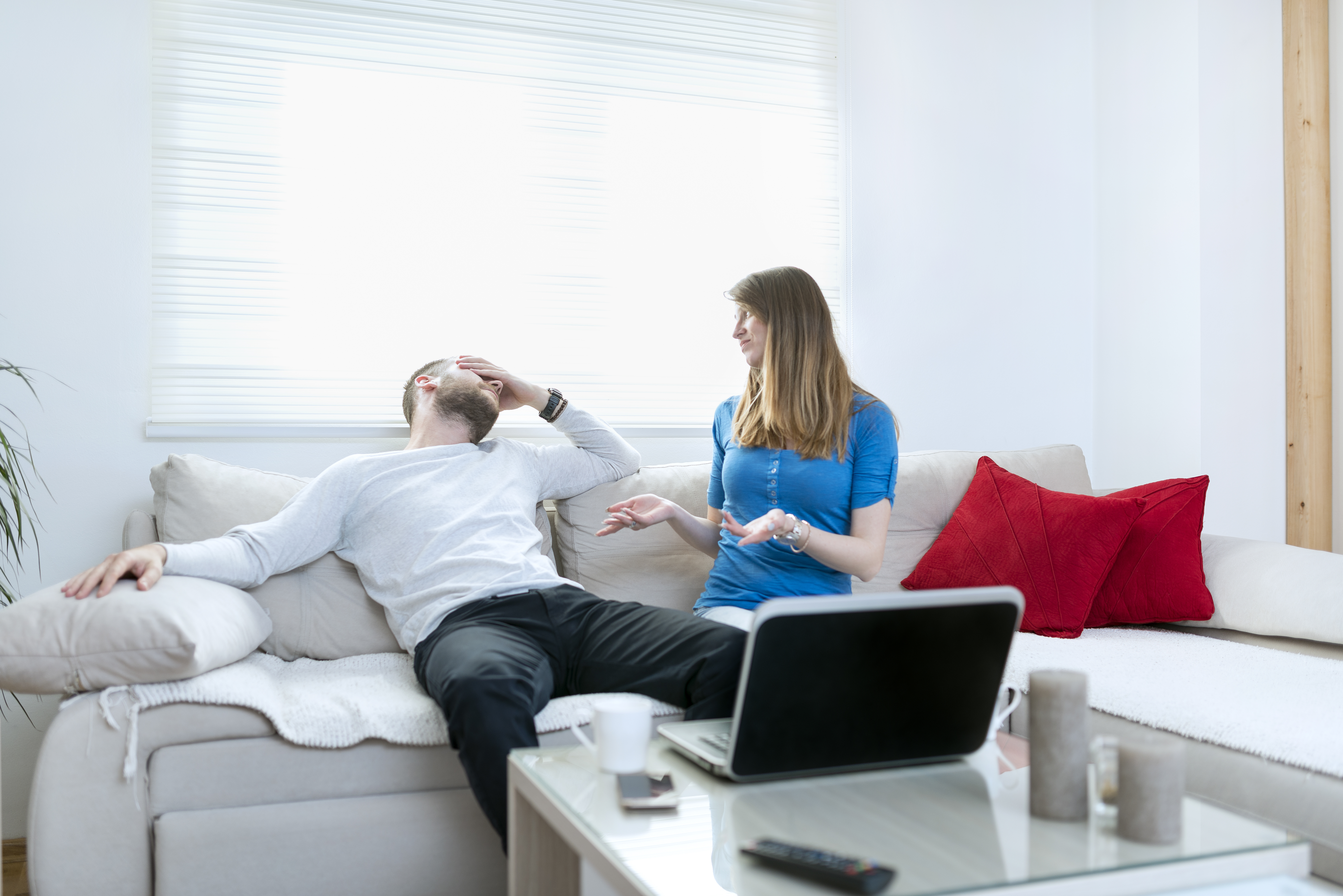 Man Suffering from Headache while Woman Quarreling