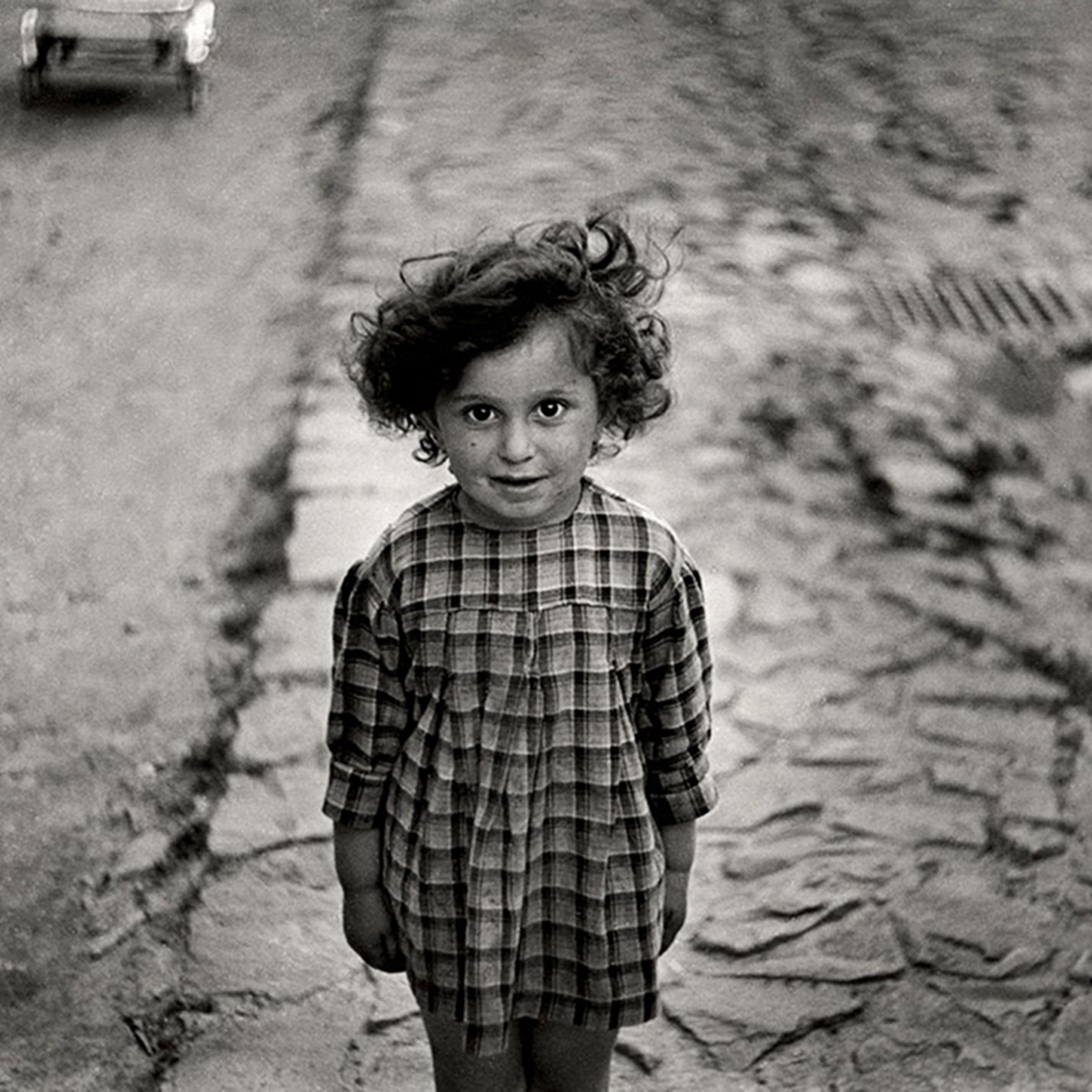 Girl in plaid dress, Mukacevo, Ukraine ca. 1935–38.
