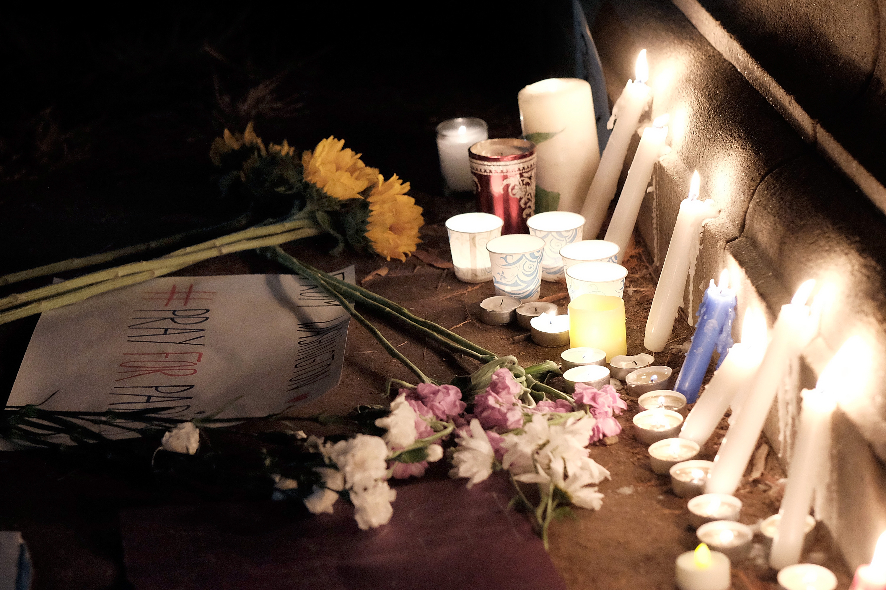 A crowd gathers for a vigil in honor of the victims of terrorist attacks in Paris at Lafayette Square outside the White House on November 14, 2015 in Washington, DC. A series of coordinated terrorist attacks in Paris yesterday killed more than 100 people