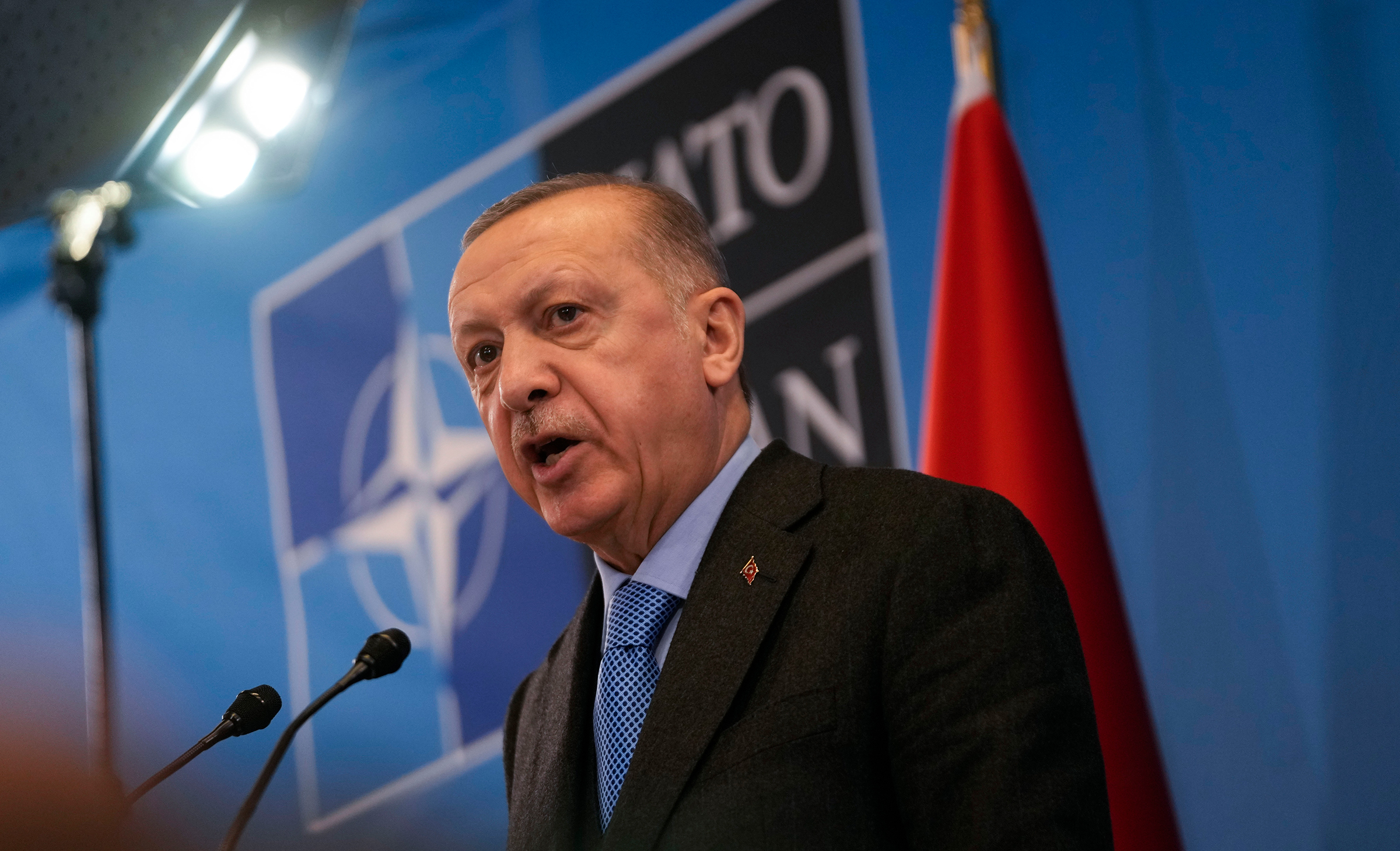 Turkish President Recep Tayyip Erdogan speaks during a media conference after a summit at NATO headquarters in Brussels, March 24, 2022.