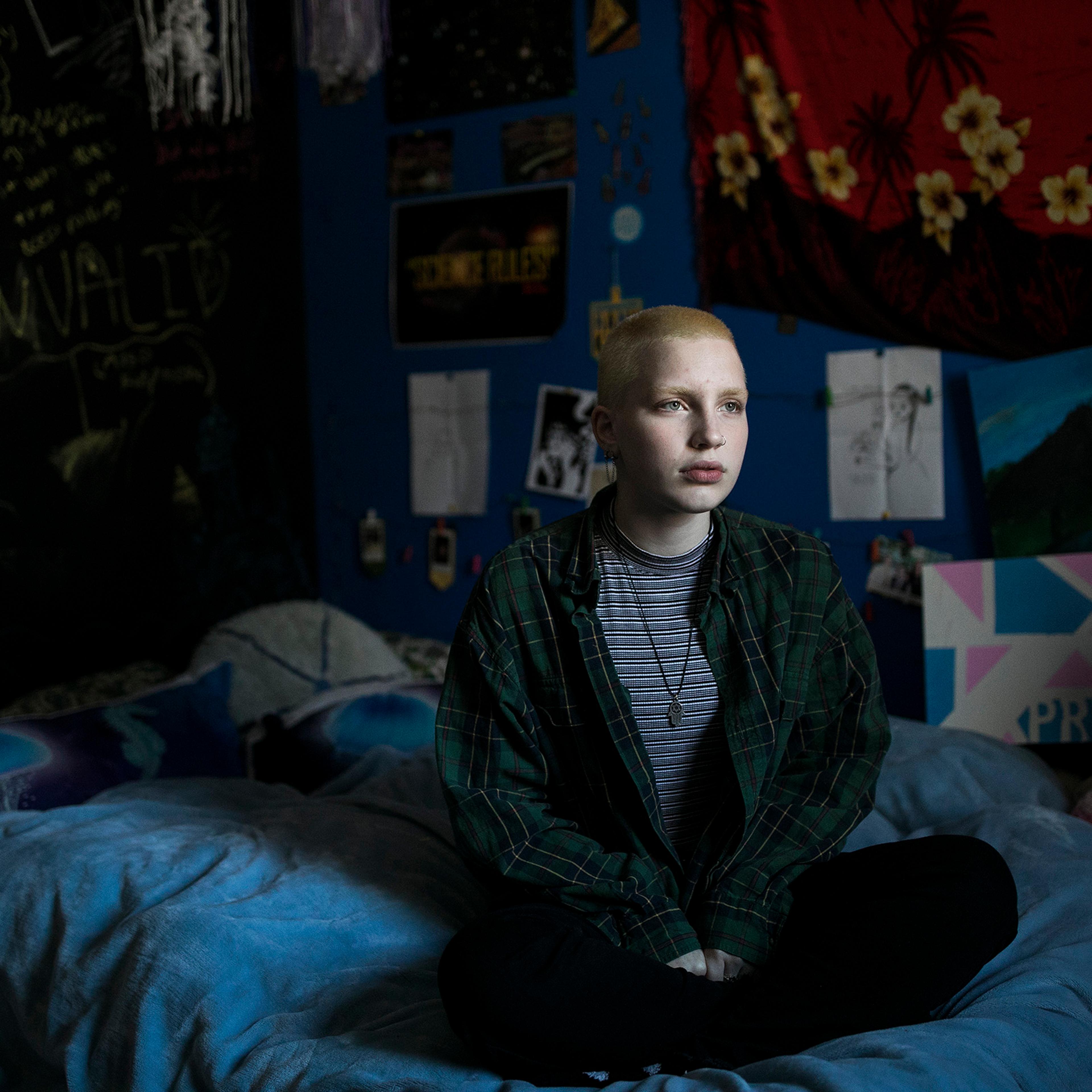 Aidyn Sucec sits in his bedroom in Brownsburg, IN on November 11, 2019. Aidyn left Brownsburg High School and the orchestra after his orchestra teacher refused to use his preferred pronouns.