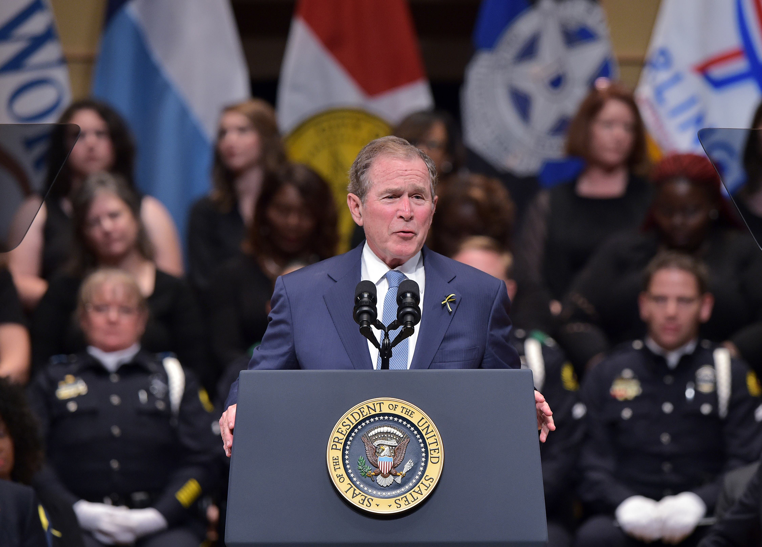 George W. Bush speaks during an interfaith memorial service for the victims of the Dallas police shooting at the Morton H. Meyerson Symphony Center in Dallas, Texas, on July 12, 2016.