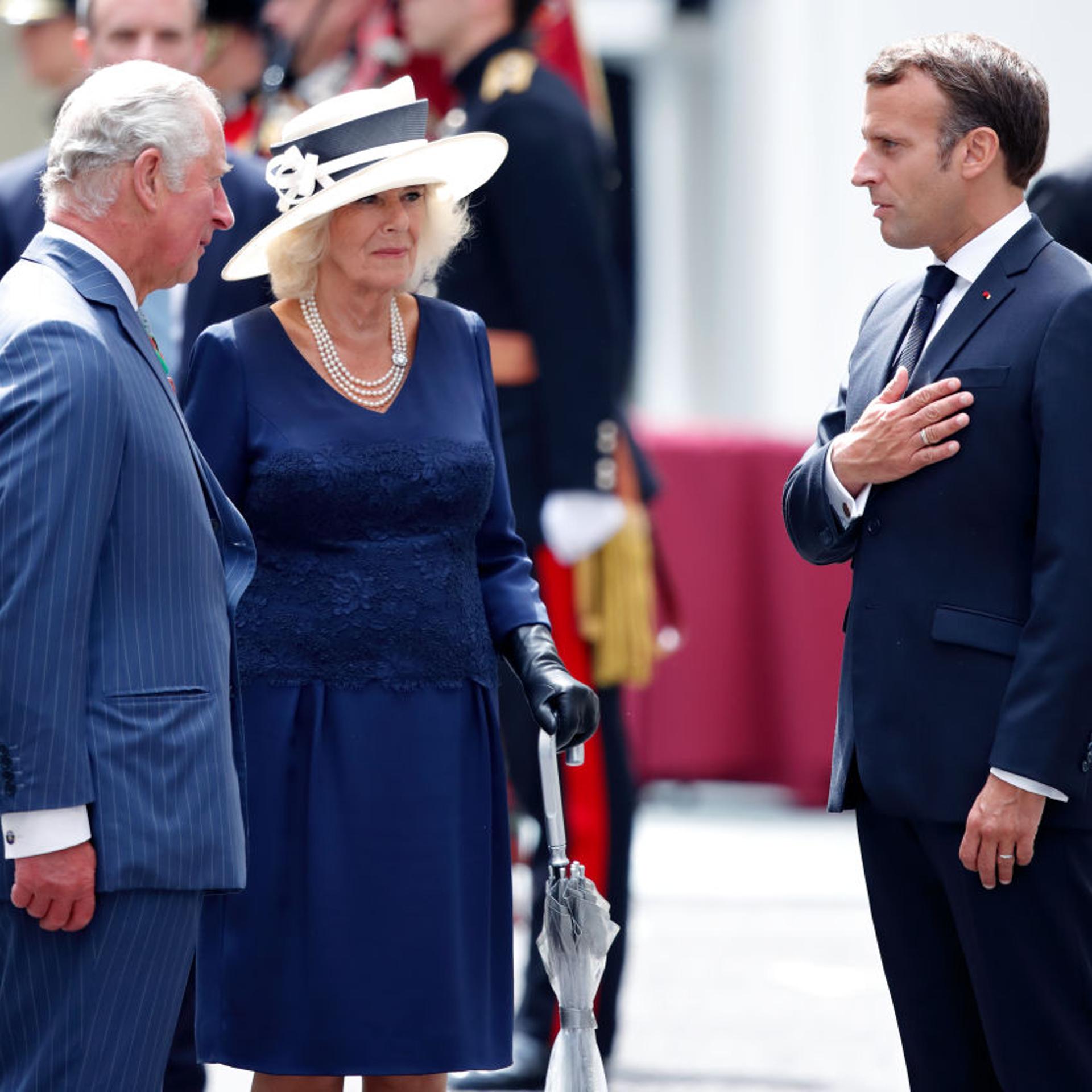 Prince Charles, Prince of Wales, Camilla, Duchess of Cornwall and French president Emmanuel Macron attend a ceremony in Carlton Gardens to commemorate the 80th anniversary of General de Gaulle's 'Appel' speech on June 18, 2020 in London.
